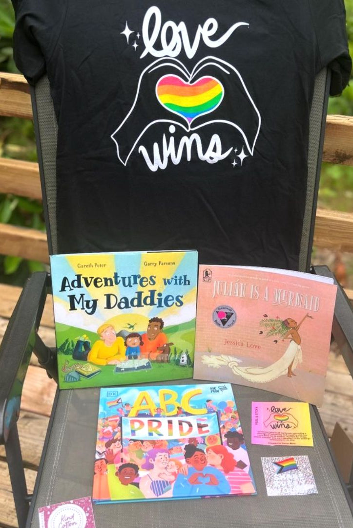 Shop Love Wins Classic Tee | Kind Cotton- at Ruby Joy Boutique, a Women's Clothing Store in Pickerington, Ohio