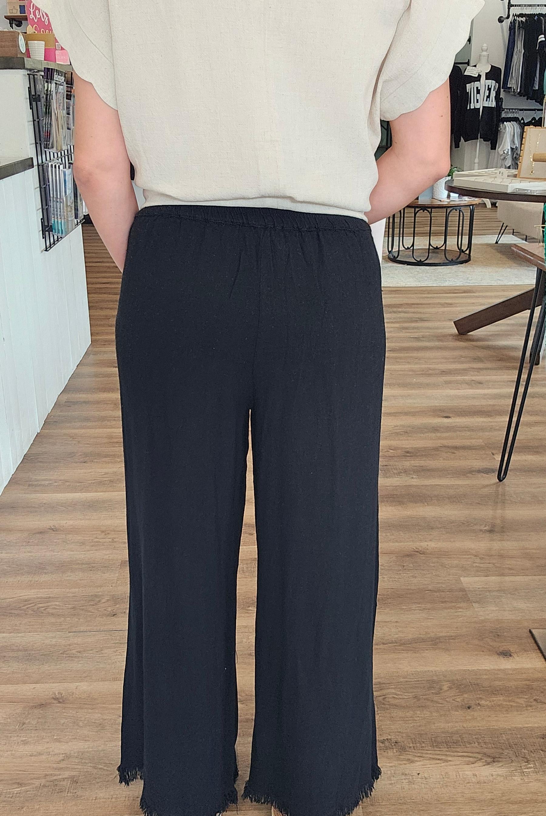 Shop Frayed Hem Wide Leg Linen Blend Pants - Black- at Ruby Joy Boutique, a Women's Clothing Store in Pickerington, Ohio