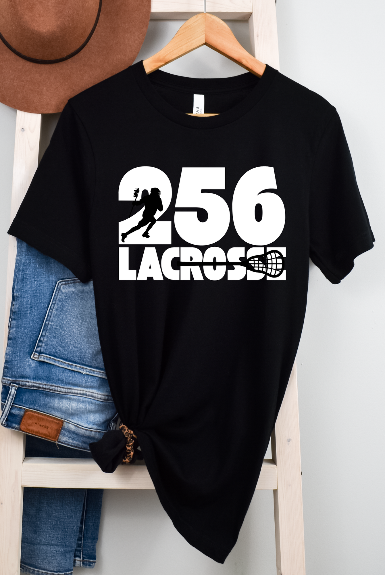 Shop 256 Cutout Silhouettes Graphic Tee-Small at Ruby Joy Boutique, a Women's Clothing Store in Pickerington, Ohio