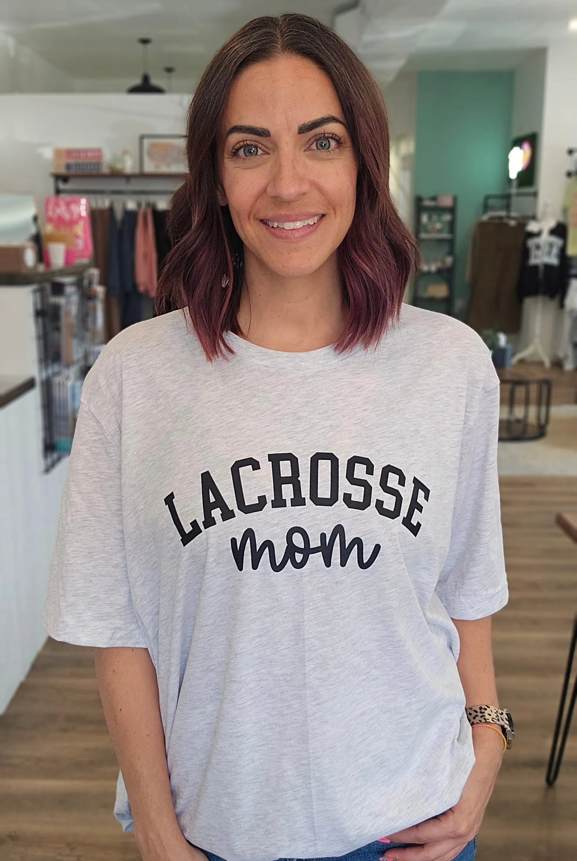 Shop 256 Lacrosse Custom Text Graphic Tee-Tee at Ruby Joy Boutique, a Women's Clothing Store in Pickerington, Ohio