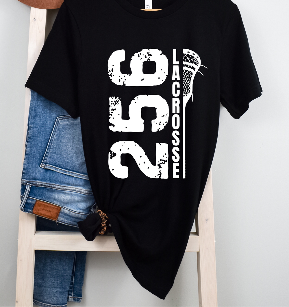 Shop 256 Vertical Lacrosse Stick Graphic Tee-Small at Ruby Joy Boutique, a Women's Clothing Store in Pickerington, Ohio