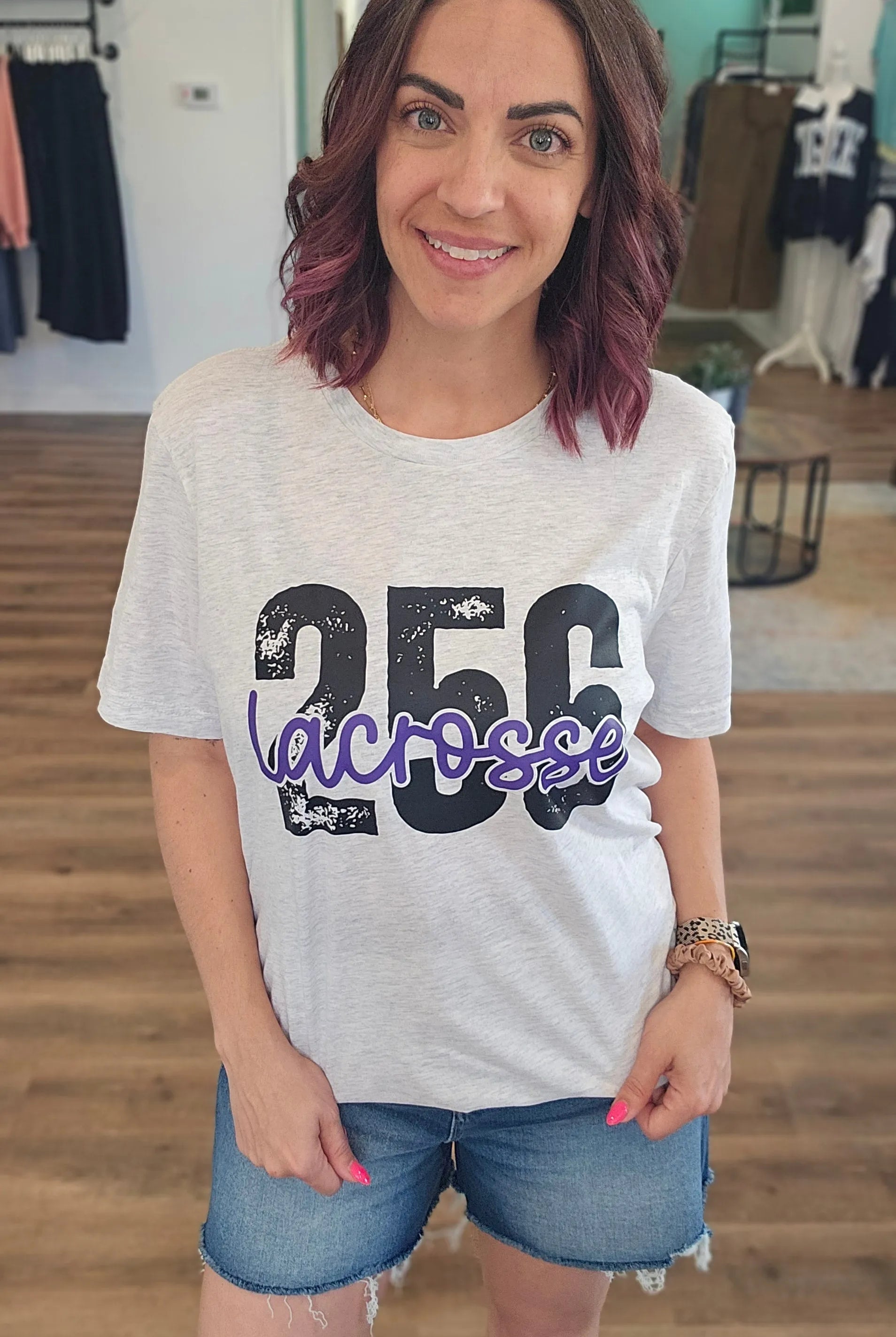 Shop 256 Lacrosse Playful Script Graphic Tee- at Ruby Joy Boutique, a Women's Clothing Store in Pickerington, Ohio