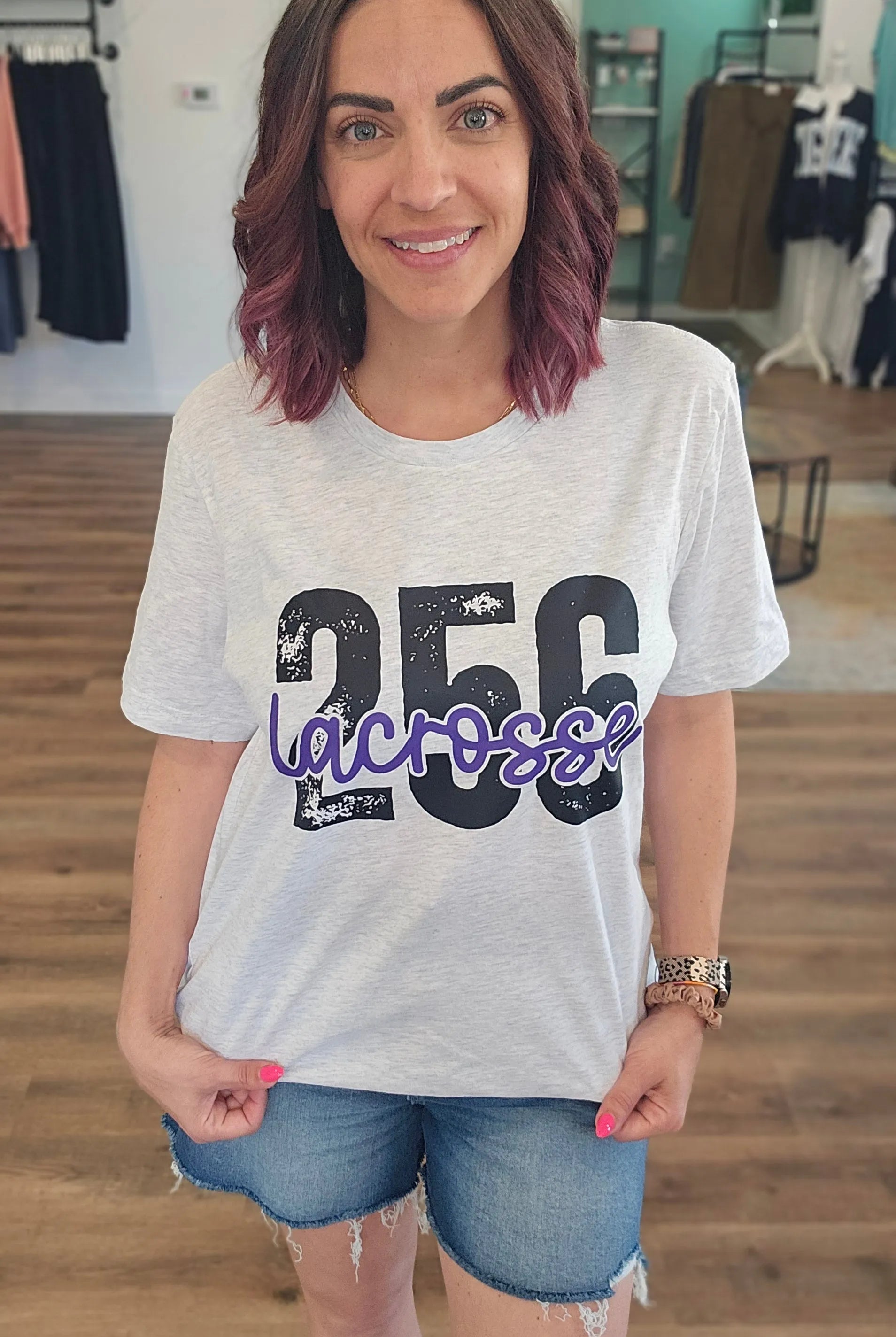 Shop 256 Lacrosse Playful Script Graphic Tee- at Ruby Joy Boutique, a Women's Clothing Store in Pickerington, Ohio