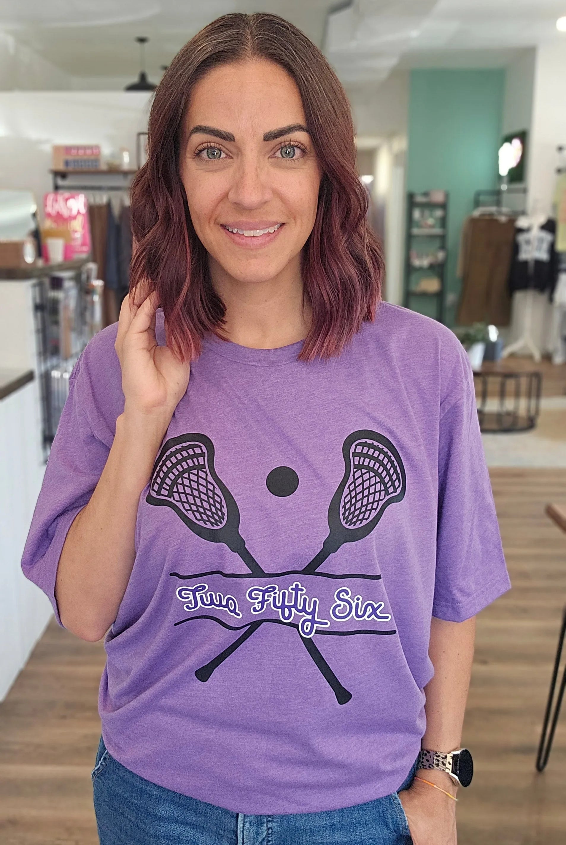 Shop 256 Lacrosse Sticks Graphic Tee- at Ruby Joy Boutique, a Women's Clothing Store in Pickerington, Ohio