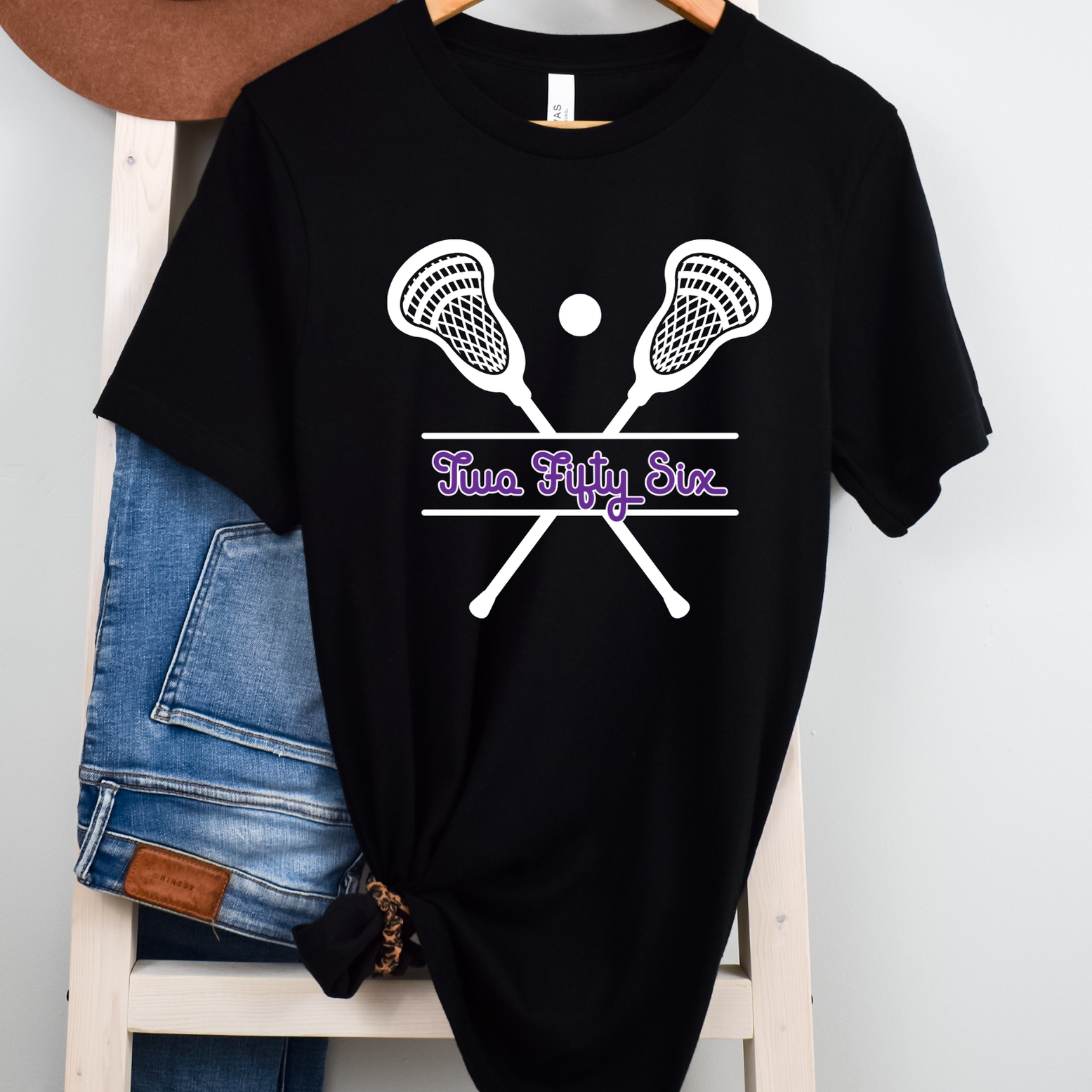 Shop 256 Lacrosse Sticks Graphic Tee-Small at Ruby Joy Boutique, a Women's Clothing Store in Pickerington, Ohio