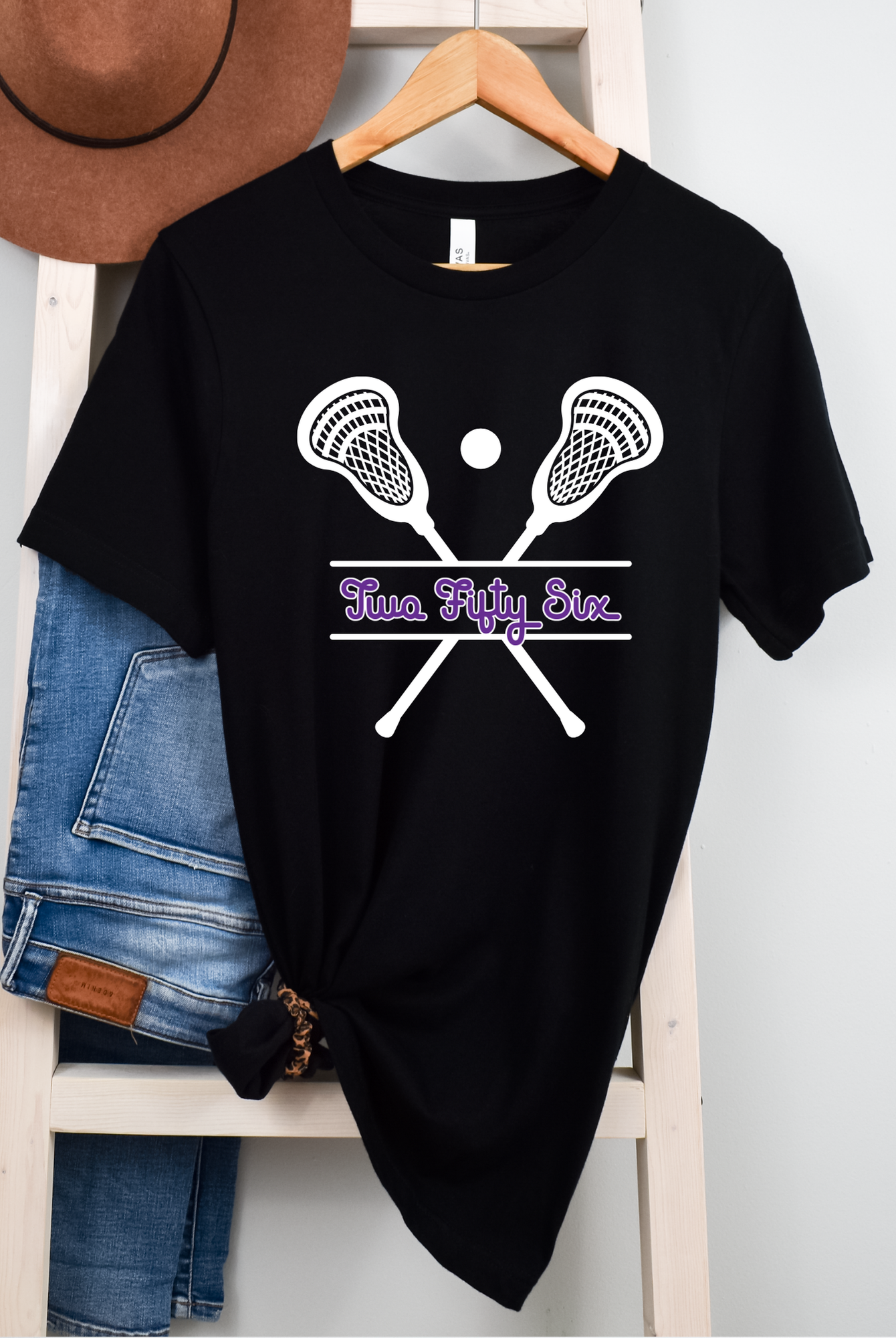 Shop 256 Lacrosse Sticks Graphic Tee-Small at Ruby Joy Boutique, a Women's Clothing Store in Pickerington, Ohio