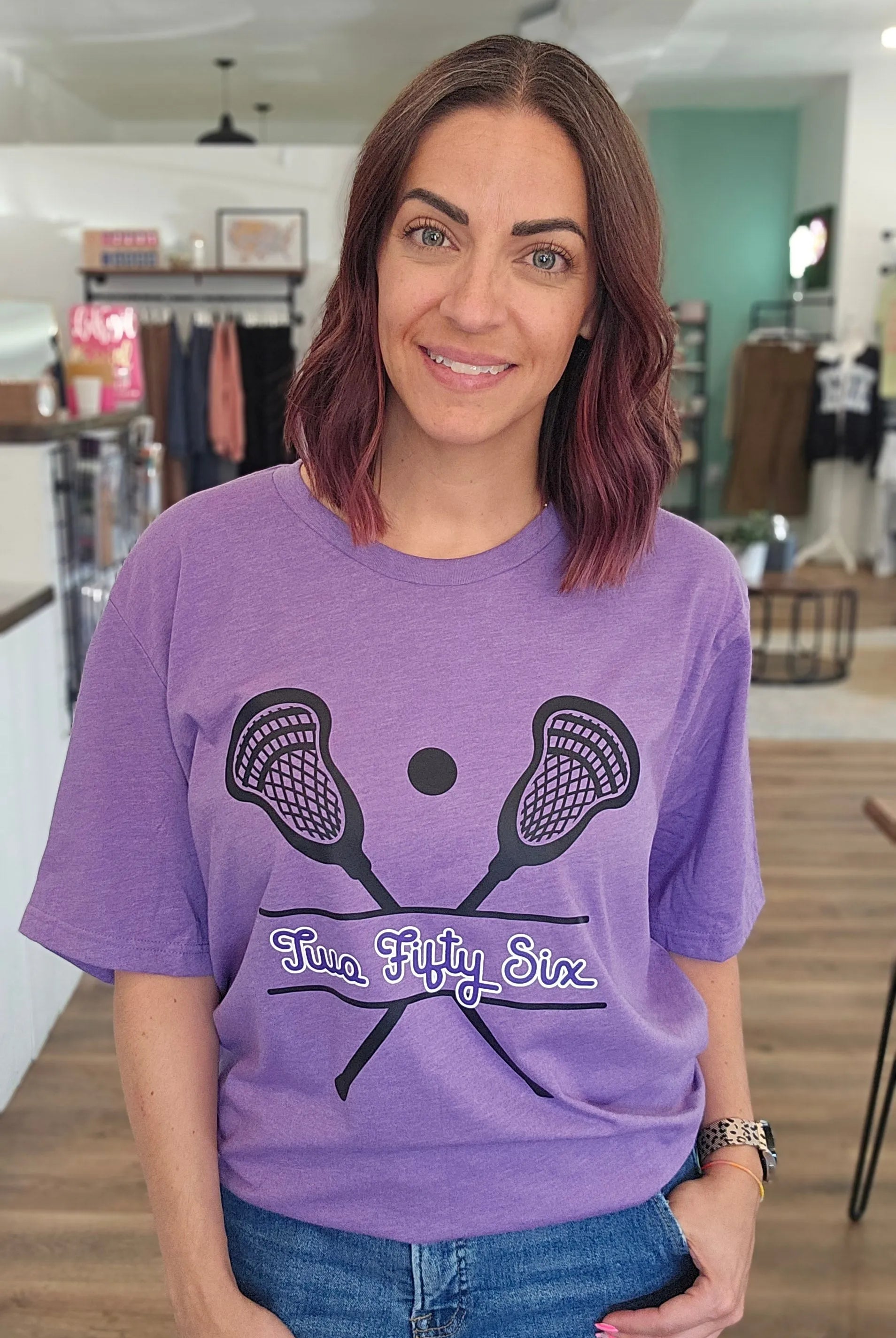 Shop 256 Lacrosse Sticks Graphic Tee- at Ruby Joy Boutique, a Women's Clothing Store in Pickerington, Ohio