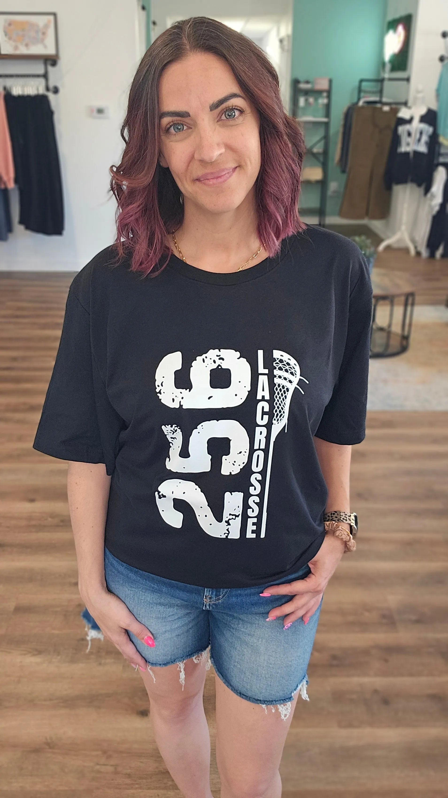 Shop 256 Vertical Lacrosse Stick Graphic Tee- at Ruby Joy Boutique, a Women's Clothing Store in Pickerington, Ohio