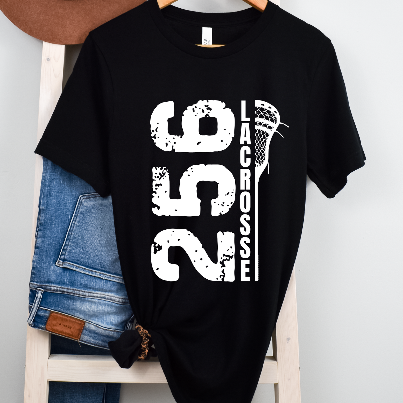 Shop 256 Vertical Lacrosse Stick Graphic Tee-Small at Ruby Joy Boutique, a Women's Clothing Store in Pickerington, Ohio