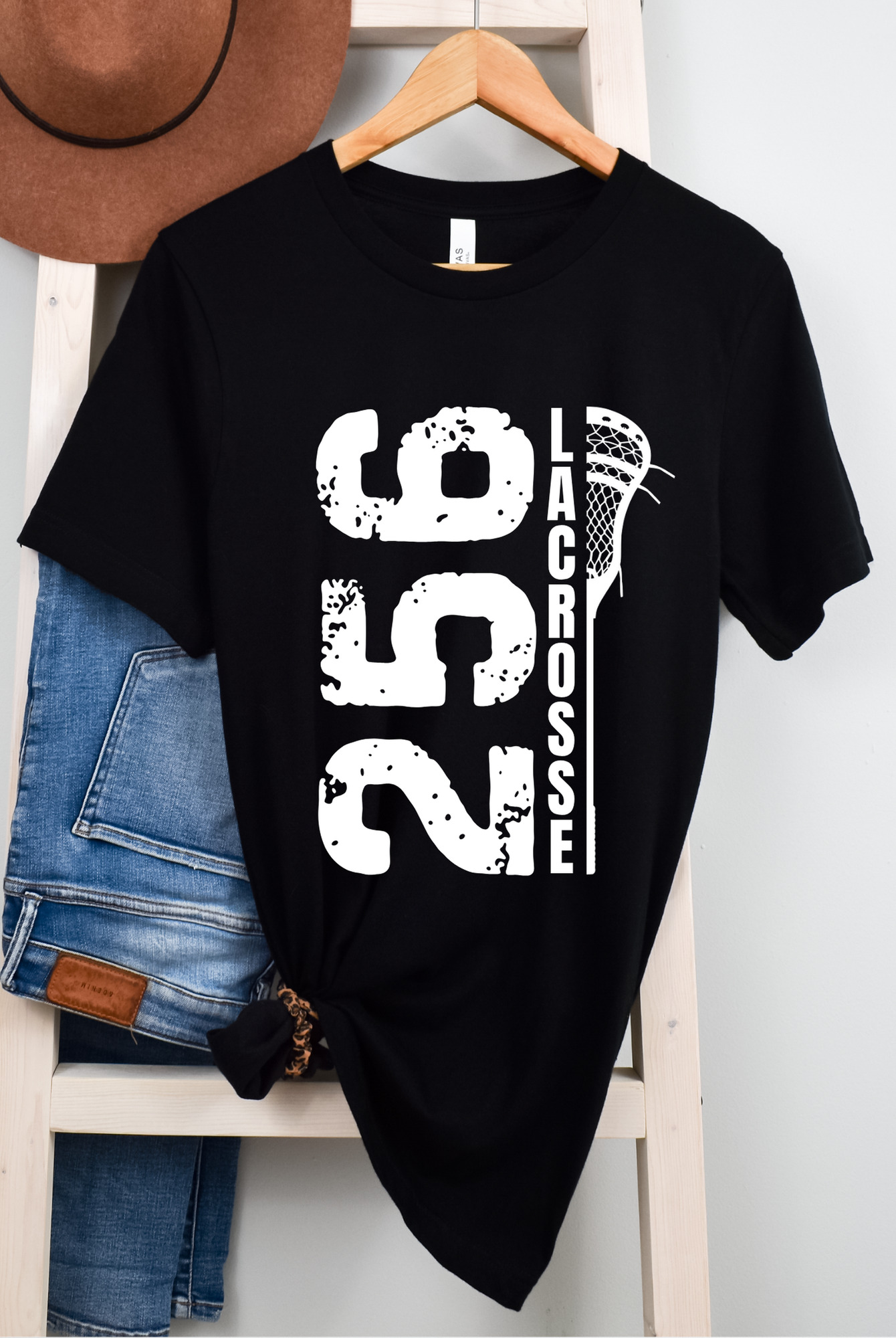 Shop 256 Vertical Lacrosse Stick Graphic Tee-Small at Ruby Joy Boutique, a Women's Clothing Store in Pickerington, Ohio