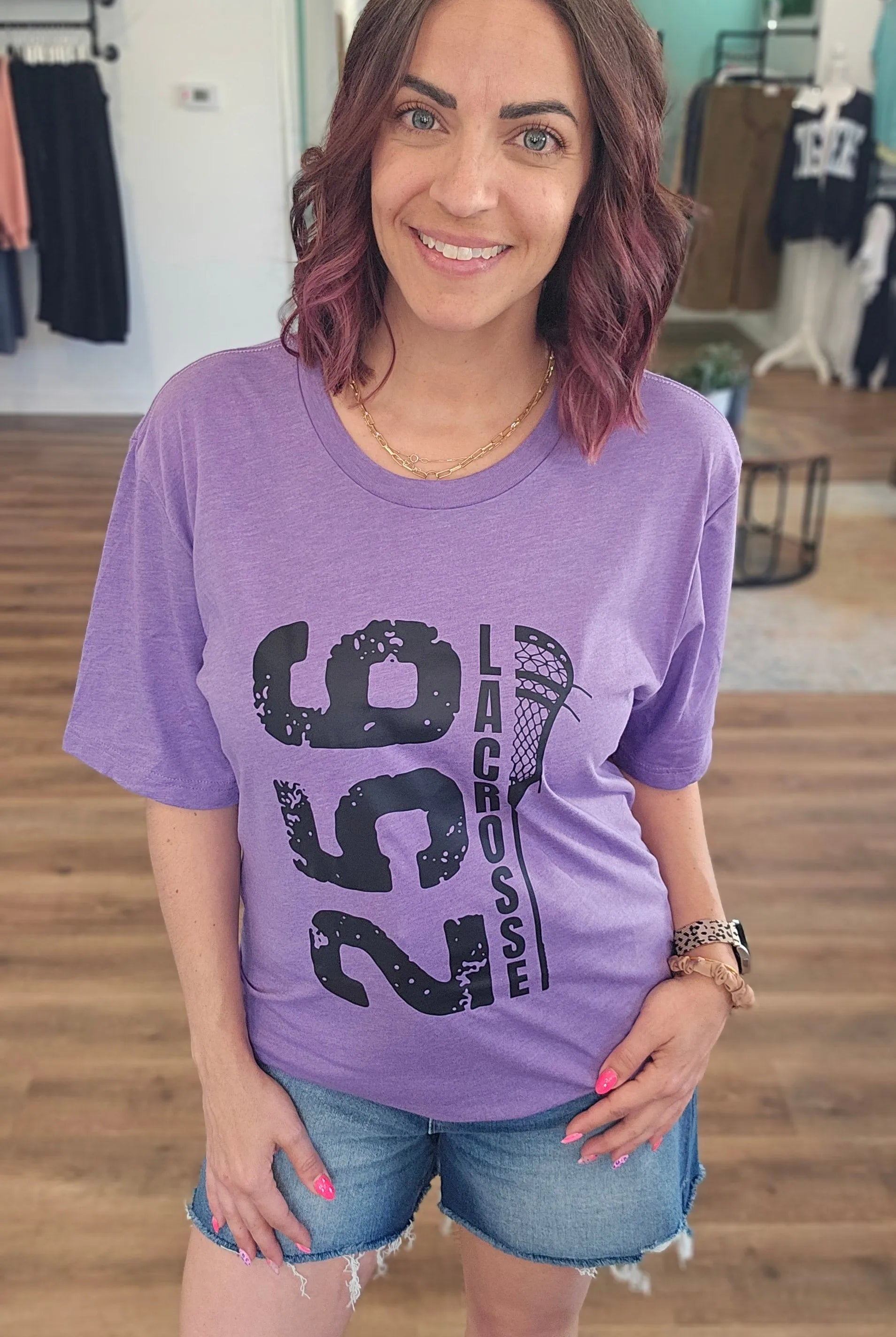 Shop 256 Vertical Lacrosse Stick Graphic Tee- at Ruby Joy Boutique, a Women's Clothing Store in Pickerington, Ohio