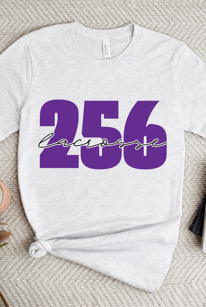 Shop 256 Lacrosse Script Graphic Tee at Ruby Joy Boutique, a Women's Clothing Store in Pickerington, Ohio