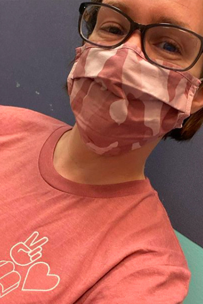 Shop Peace, Love, Books Classic Tee | Kind Cotton- at Ruby Joy Boutique, a Women's Clothing Store in Pickerington, Ohio