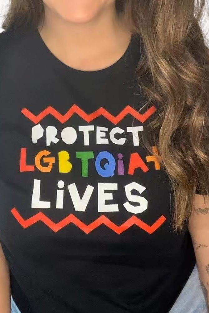 Shop Protect LGBTQIA+ Lives Classic Tee- at Ruby Joy Boutique, a Women's Clothing Store in Pickerington, Ohio