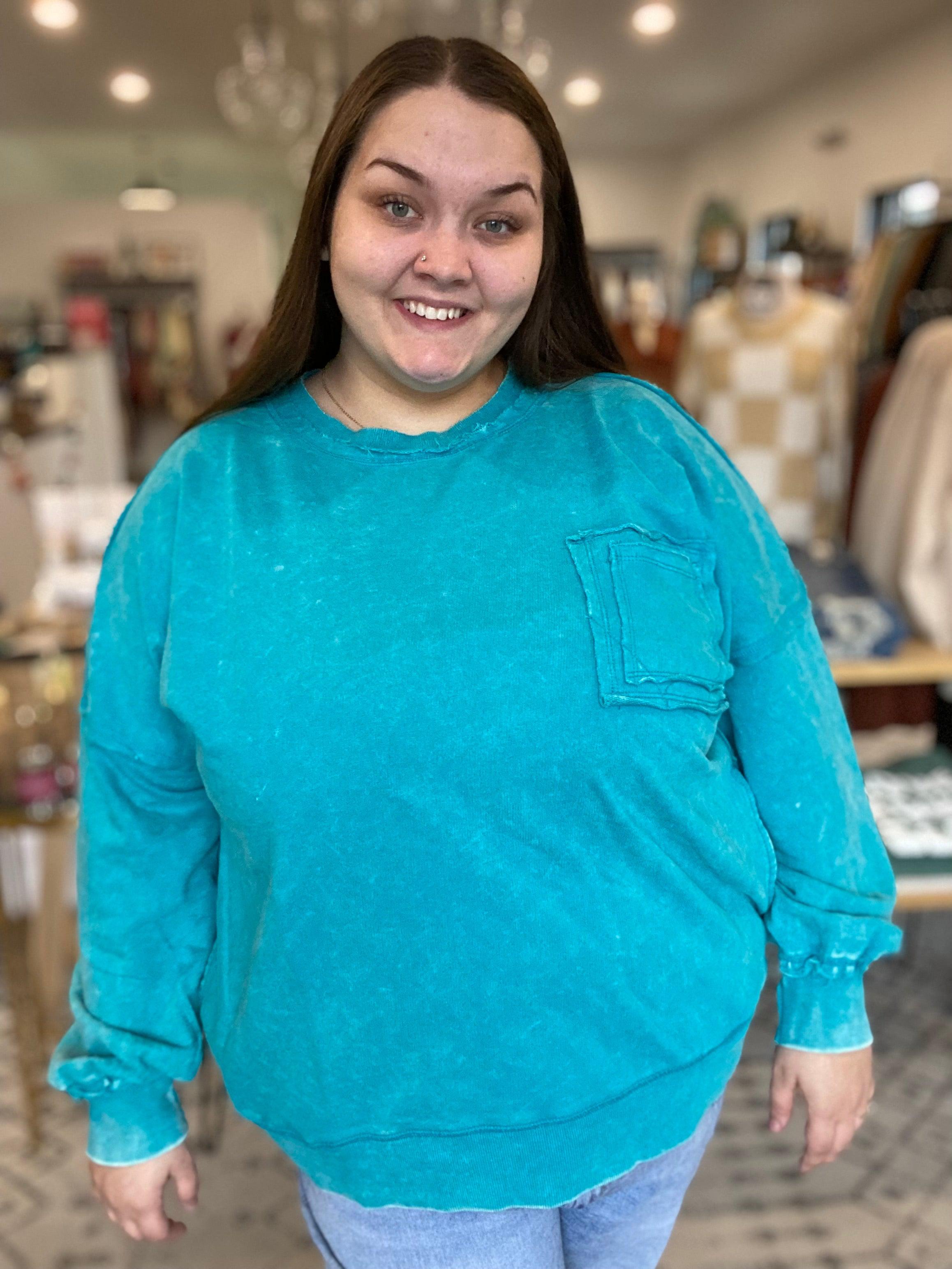 Shop Acid Wash Raw Edge Pullover with Pockets - Turquoise-sweatshirt at Ruby Joy Boutique, a Women's Clothing Store in Pickerington, Ohio