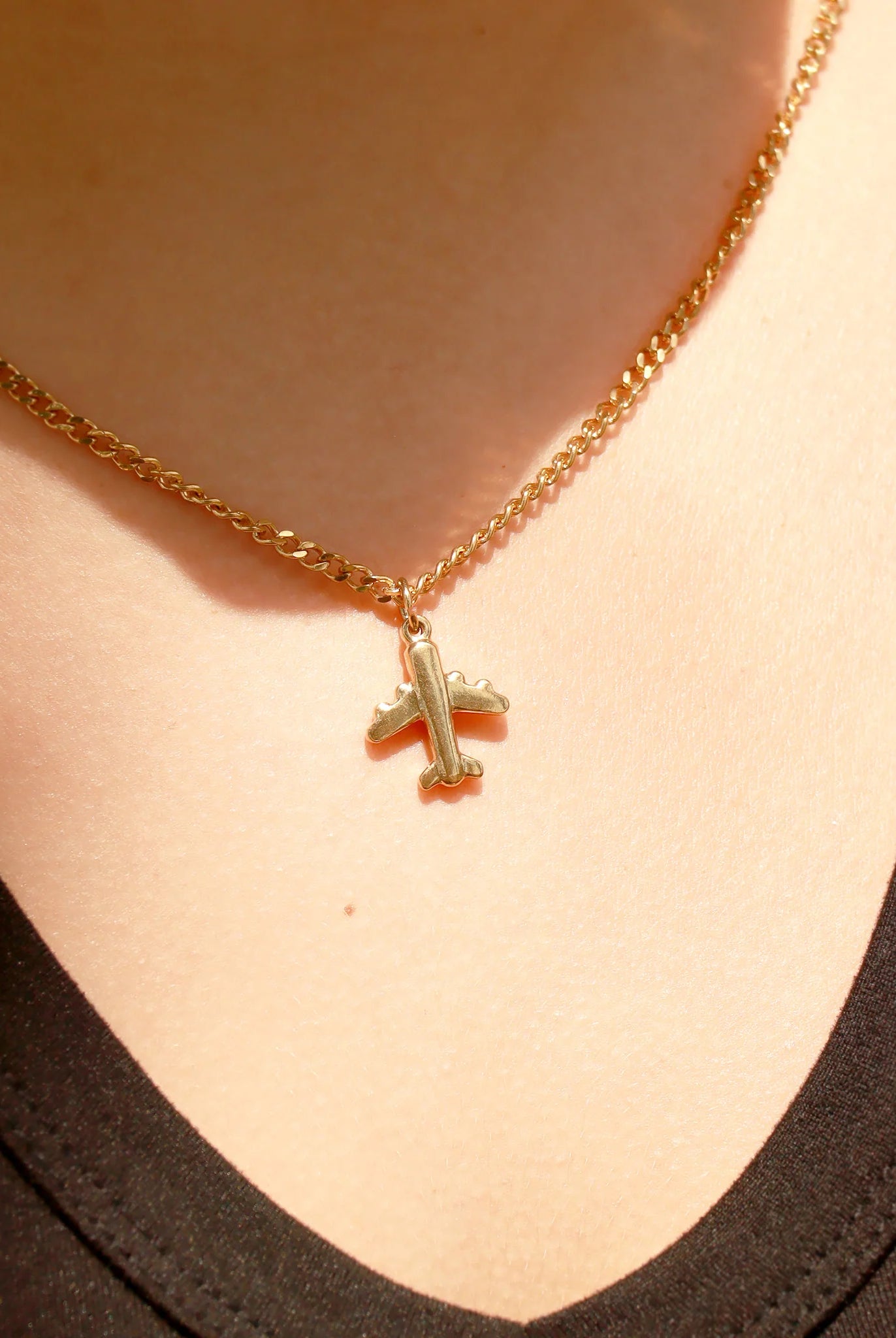 Shop Airplane Charm- at Ruby Joy Boutique, a Women's Clothing Store in Pickerington, Ohio