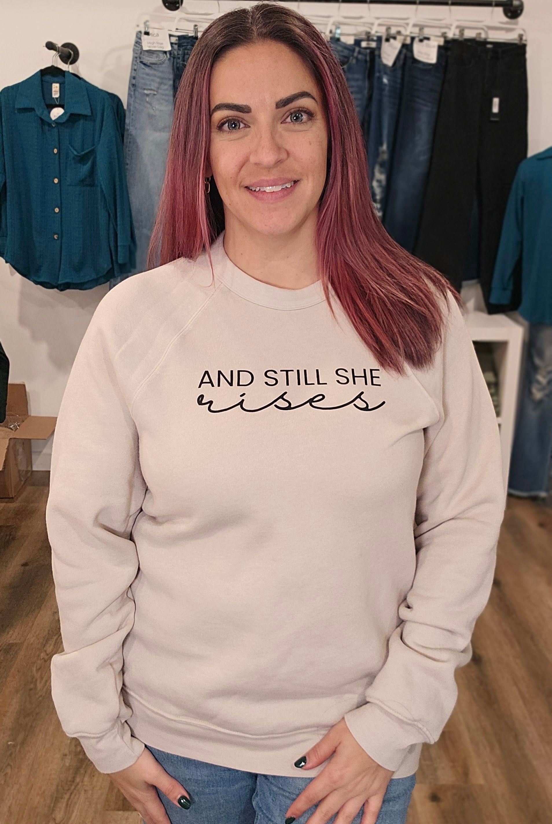 Shop And Still She Rises Sweatshirt-Custom Sweatshirt at Ruby Joy Boutique, a Women's Clothing Store in Pickerington, Ohio