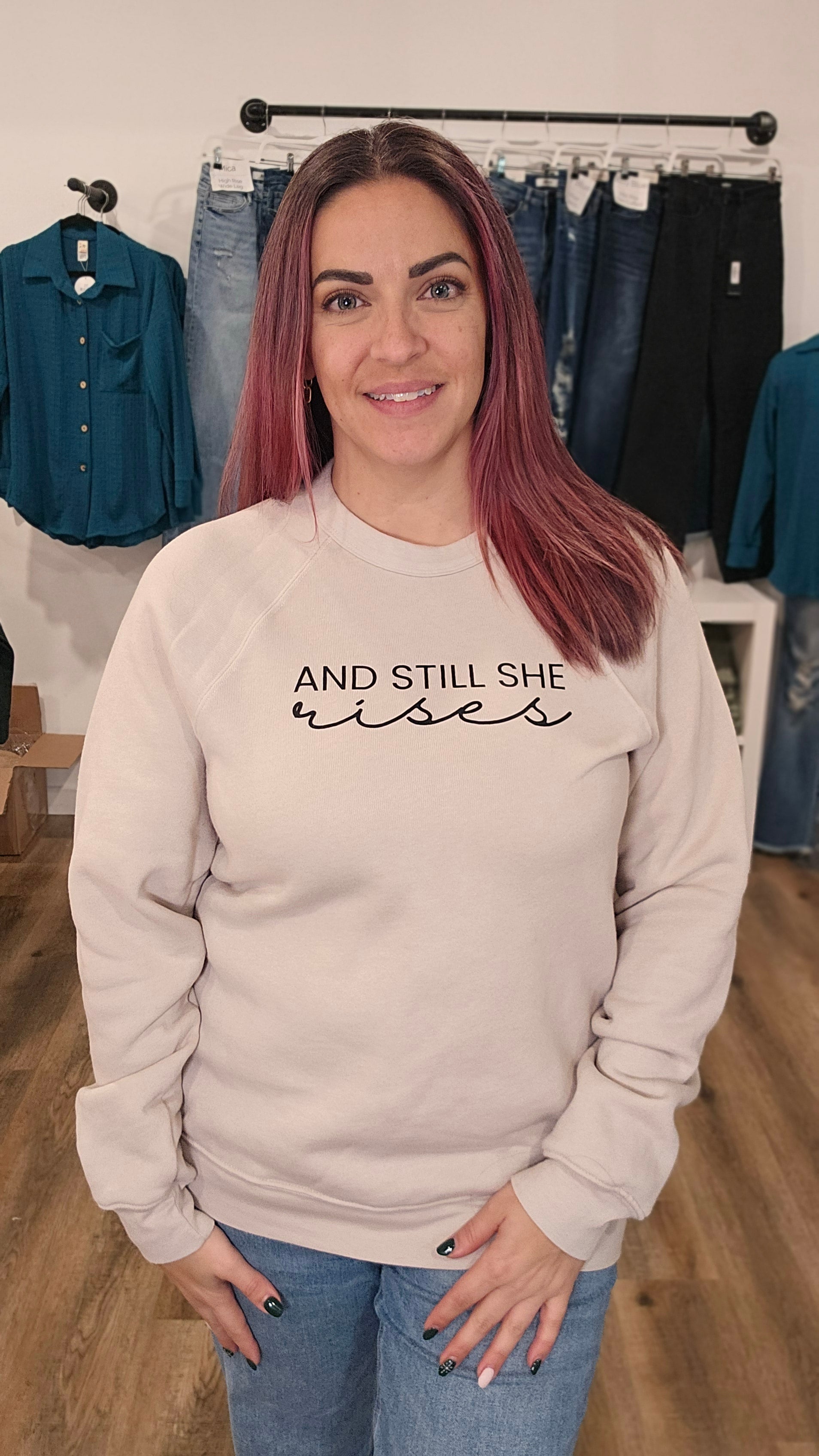 Shop And Still She Rises Sweatshirt-Custom Sweatshirt at Ruby Joy Boutique, a Women's Clothing Store in Pickerington, Ohio