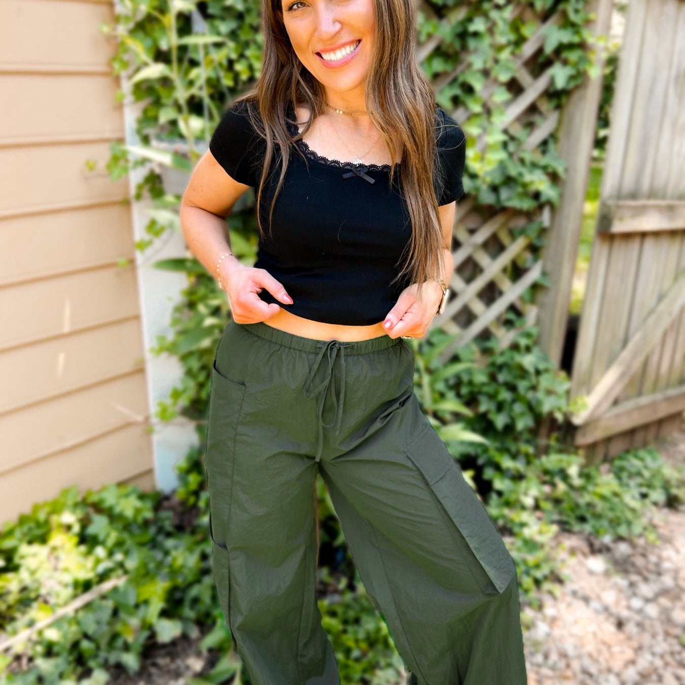 Shop Archer Asymmetrical Pocket Wide Leg Cargos-Dark Forest at Ruby Joy Boutique, a Women's Clothing Store in Pickerington, Ohio