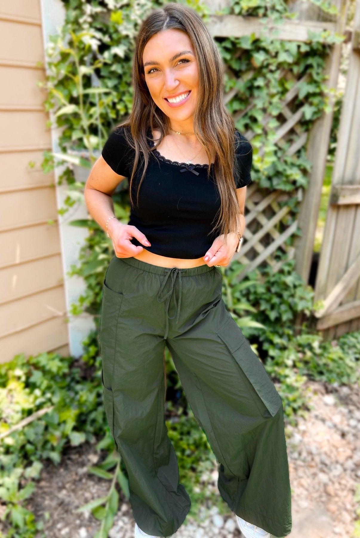 Shop Archer Asymmetrical Pocket Wide Leg Cargos-Dark Forest at Ruby Joy Boutique, a Women's Clothing Store in Pickerington, Ohio