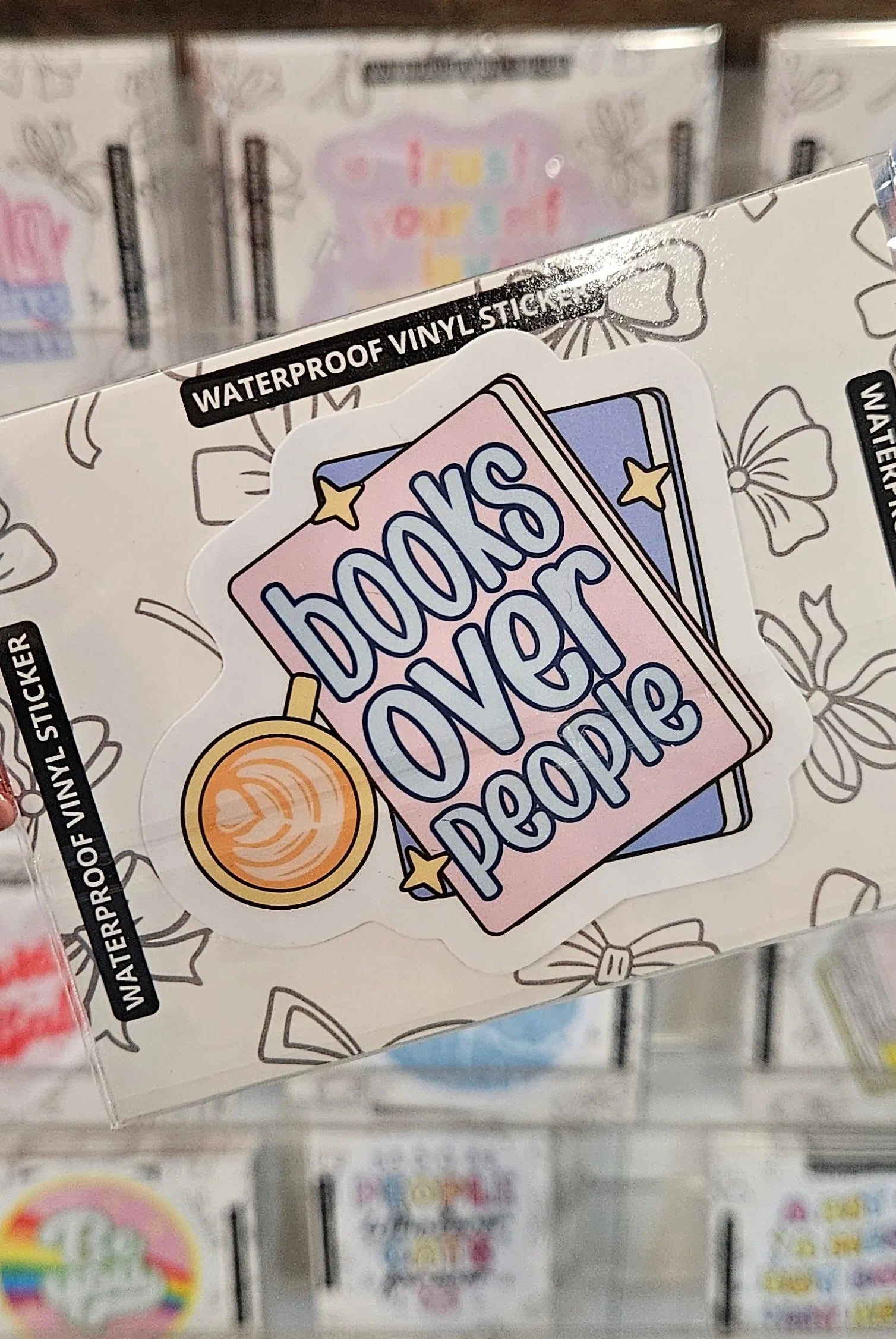 Shop Books Over People | Waterproof Vinyl Sticker- at Ruby Joy Boutique, a Women's Clothing Store in Pickerington, Ohio