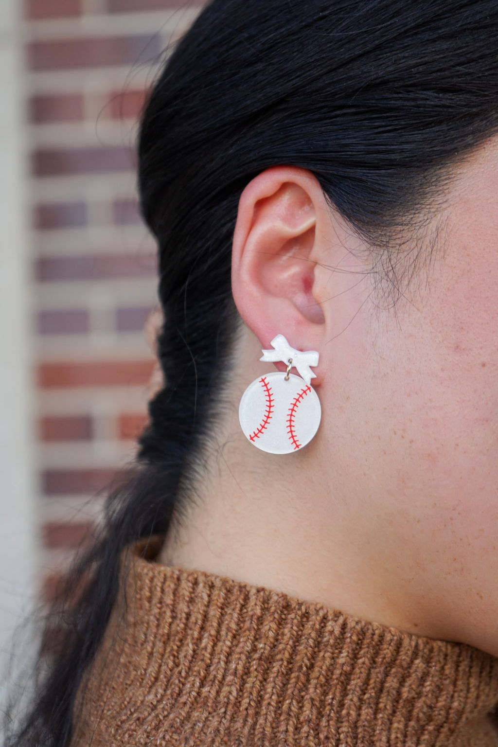 Shop Bow Baseball Earrings- at Ruby Joy Boutique, a Women's Clothing Store in Pickerington, Ohio