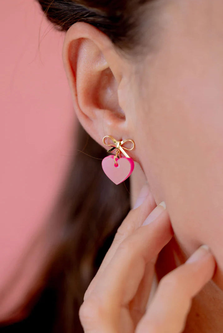 Shop Bow Heart Dangle Earrings- at Ruby Joy Boutique, a Women's Clothing Store in Pickerington, Ohio