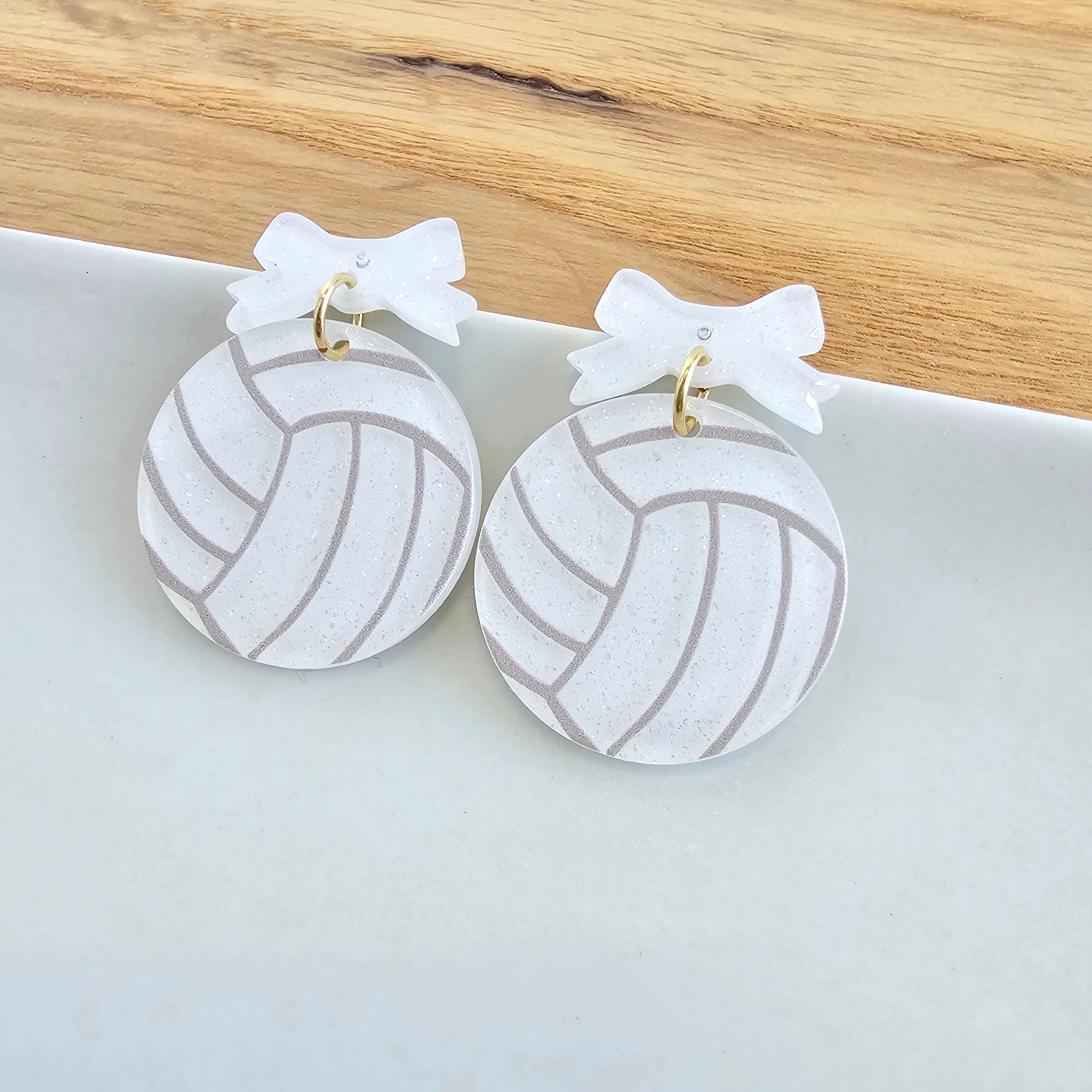 Shop Bow Volleyball Earrings- at Ruby Joy Boutique, a Women's Clothing Store in Pickerington, Ohio