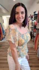 Shop Brielle Smocked Top-Blouse at Ruby Joy Boutique, a Women's Clothing Store in Pickerington, Ohio