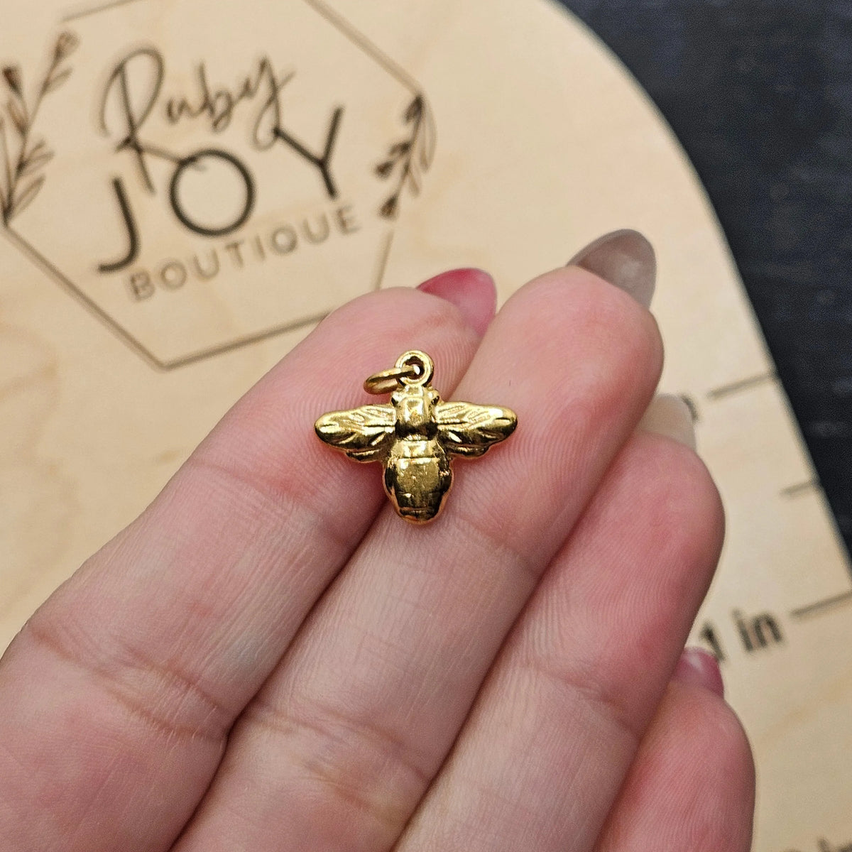 Shop Bumblebee Charm- at Ruby Joy Boutique, a Women's Clothing Store in Pickerington, Ohio