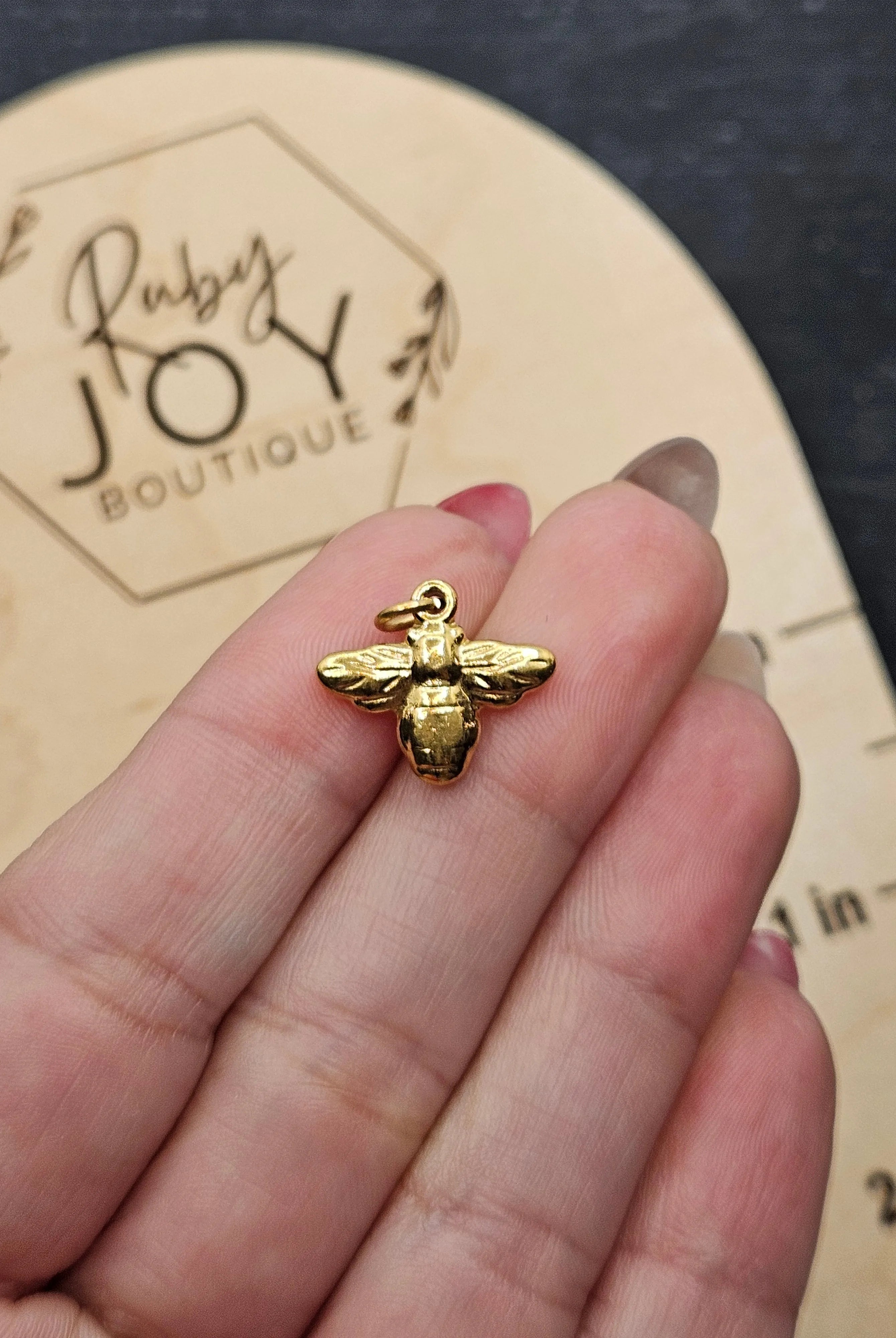 Shop Bumblebee Charm- at Ruby Joy Boutique, a Women's Clothing Store in Pickerington, Ohio