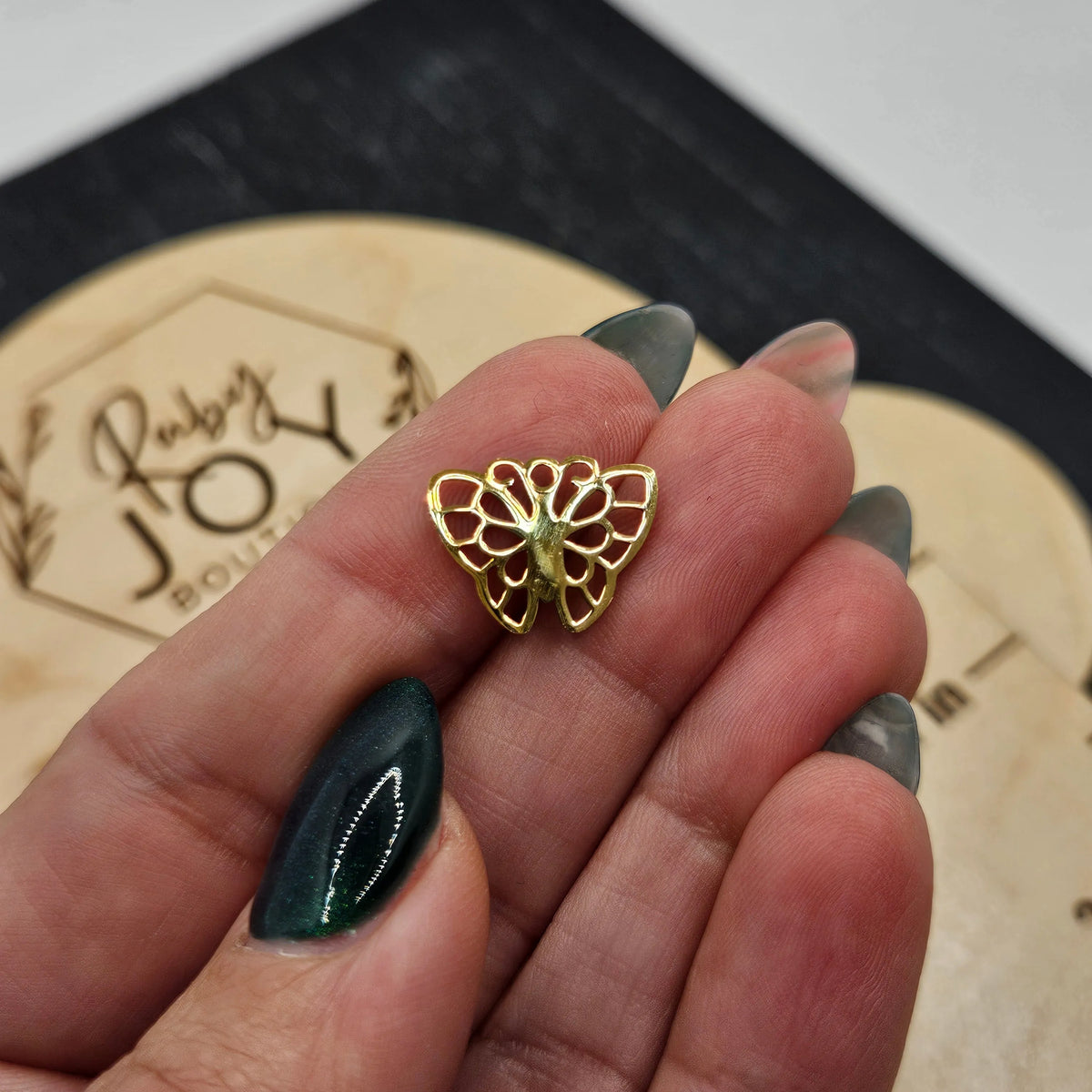 Shop Butterfly Charm- at Ruby Joy Boutique, a Women's Clothing Store in Pickerington, Ohio