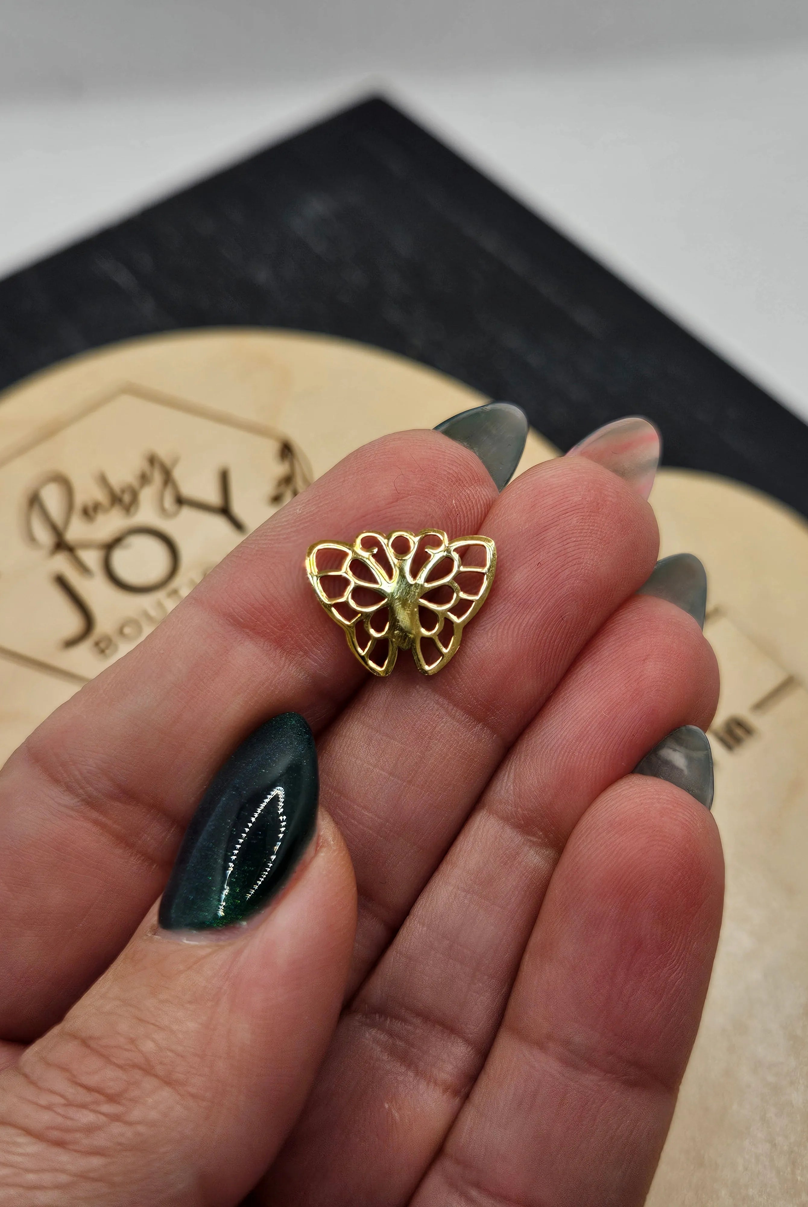 Shop Butterfly Charm- at Ruby Joy Boutique, a Women's Clothing Store in Pickerington, Ohio