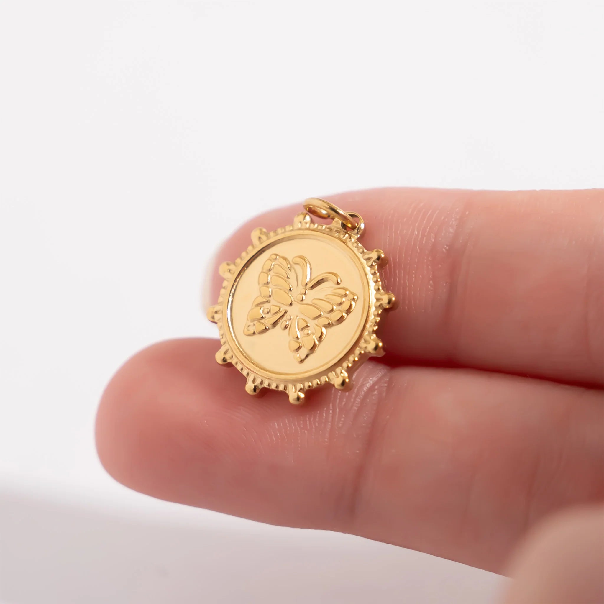 Shop Butterfly Coin Charm- at Ruby Joy Boutique, a Women's Clothing Store in Pickerington, Ohio