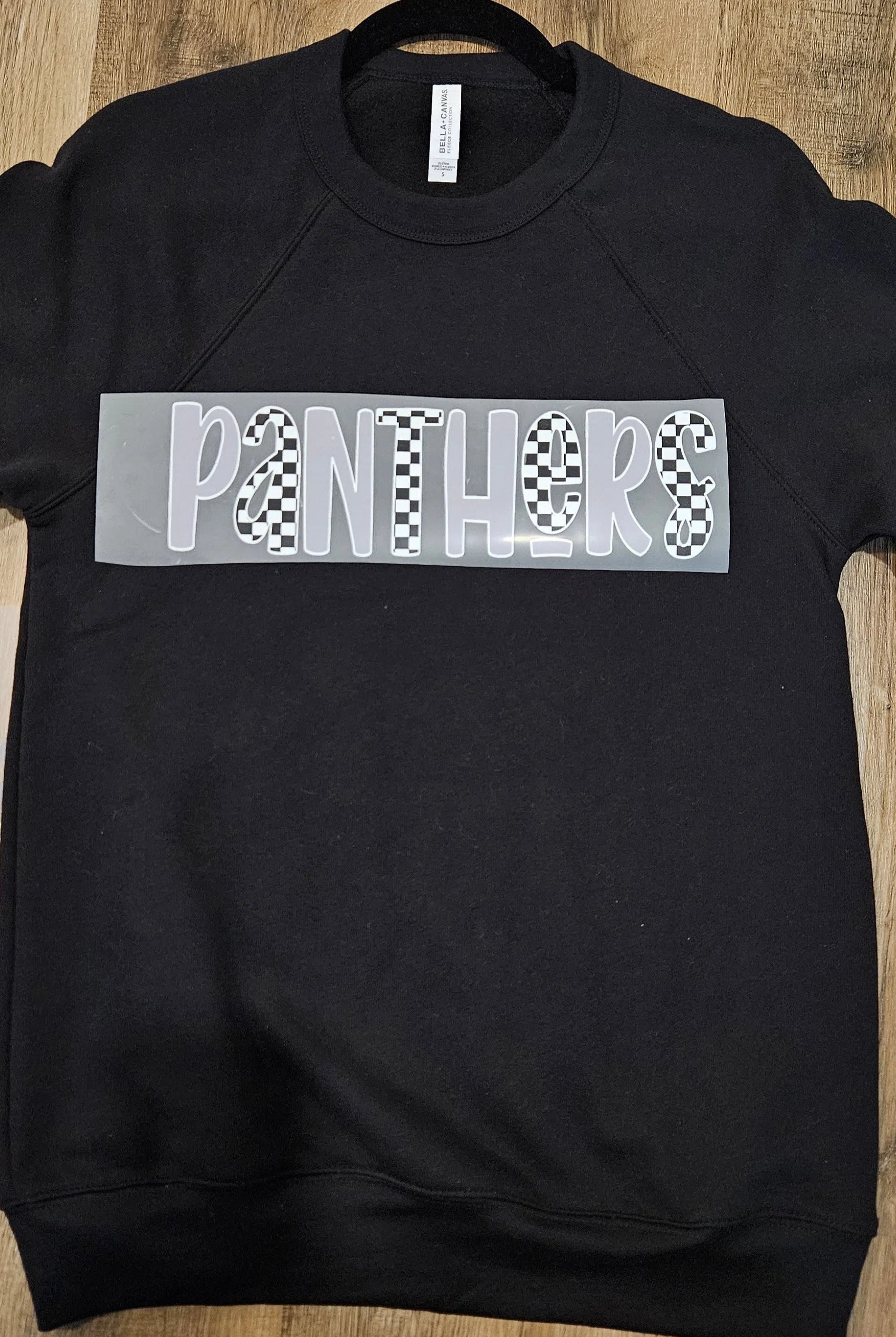 Shop Checkered Mascot Graphic - Panthers- at Ruby Joy Boutique, a Women's Clothing Store in Pickerington, Ohio