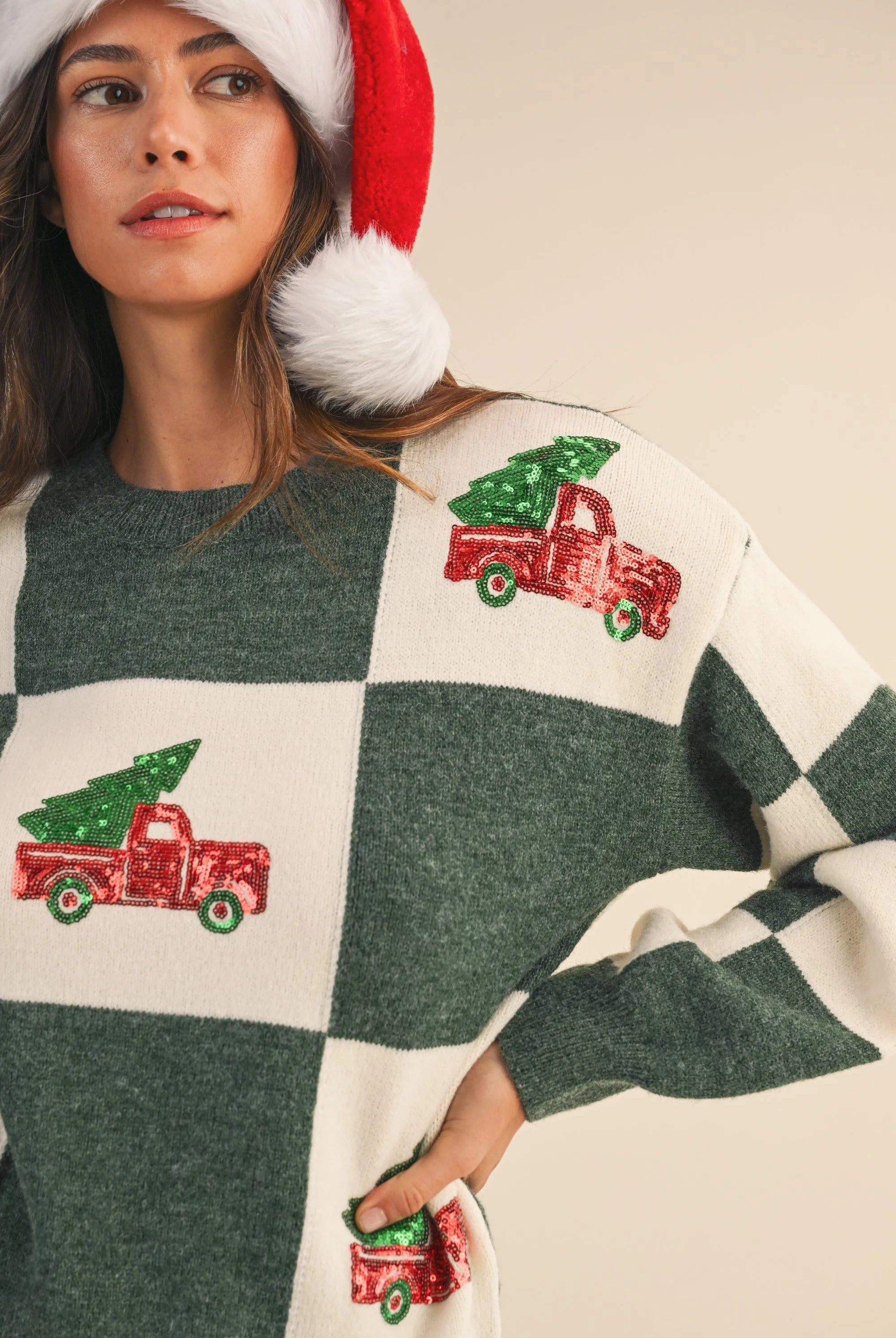 Shop Checkered Sweater with Christmas Tree Truck Sequin Patch- at Ruby Joy Boutique, a Women's Clothing Store in Pickerington, Ohio
