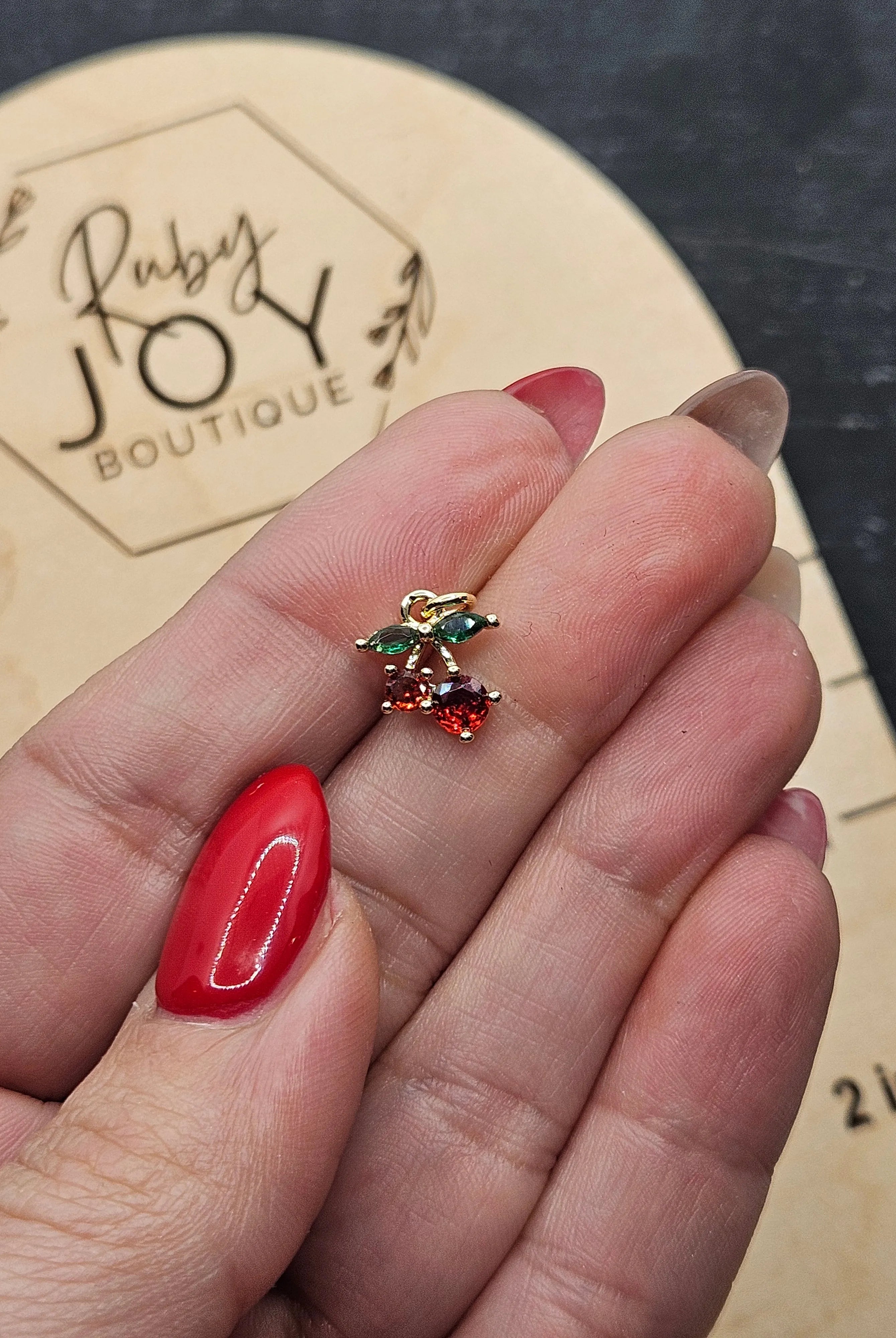 Shop Cherry Charm | Gold-Filled- at Ruby Joy Boutique, a Women's Clothing Store in Pickerington, Ohio