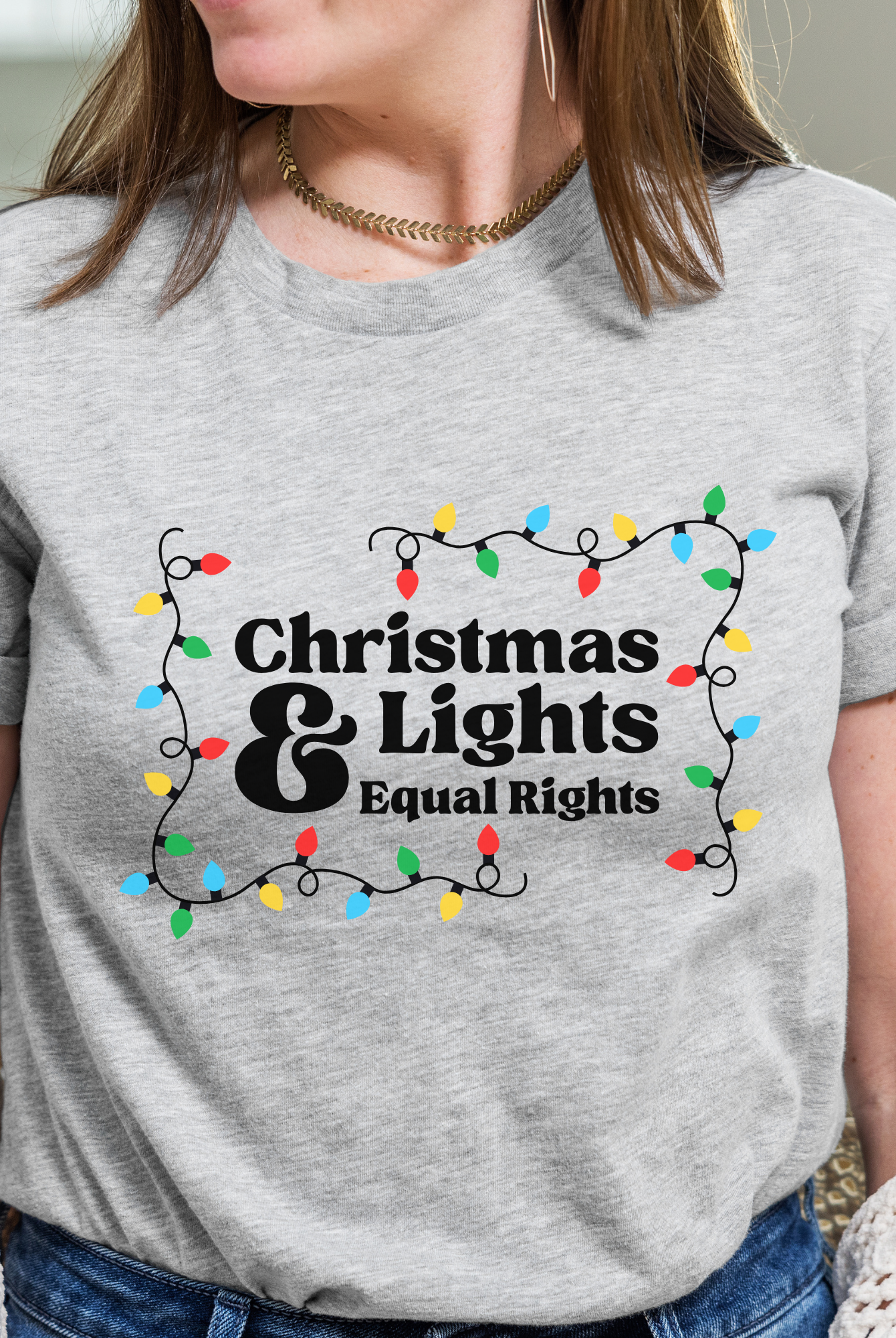 Shop Christmas Lights and Equal Rights Graphic Top- at Ruby Joy Boutique, a Women's Clothing Store in Pickerington, Ohio