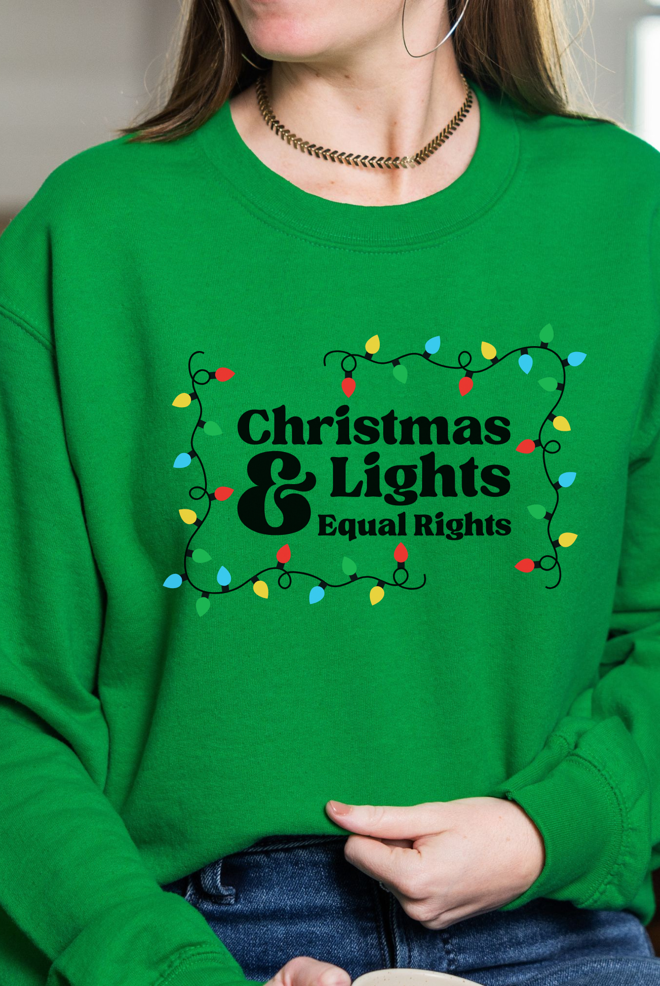 Shop Christmas Lights and Equal Rights Graphic Top- at Ruby Joy Boutique, a Women's Clothing Store in Pickerington, Ohio