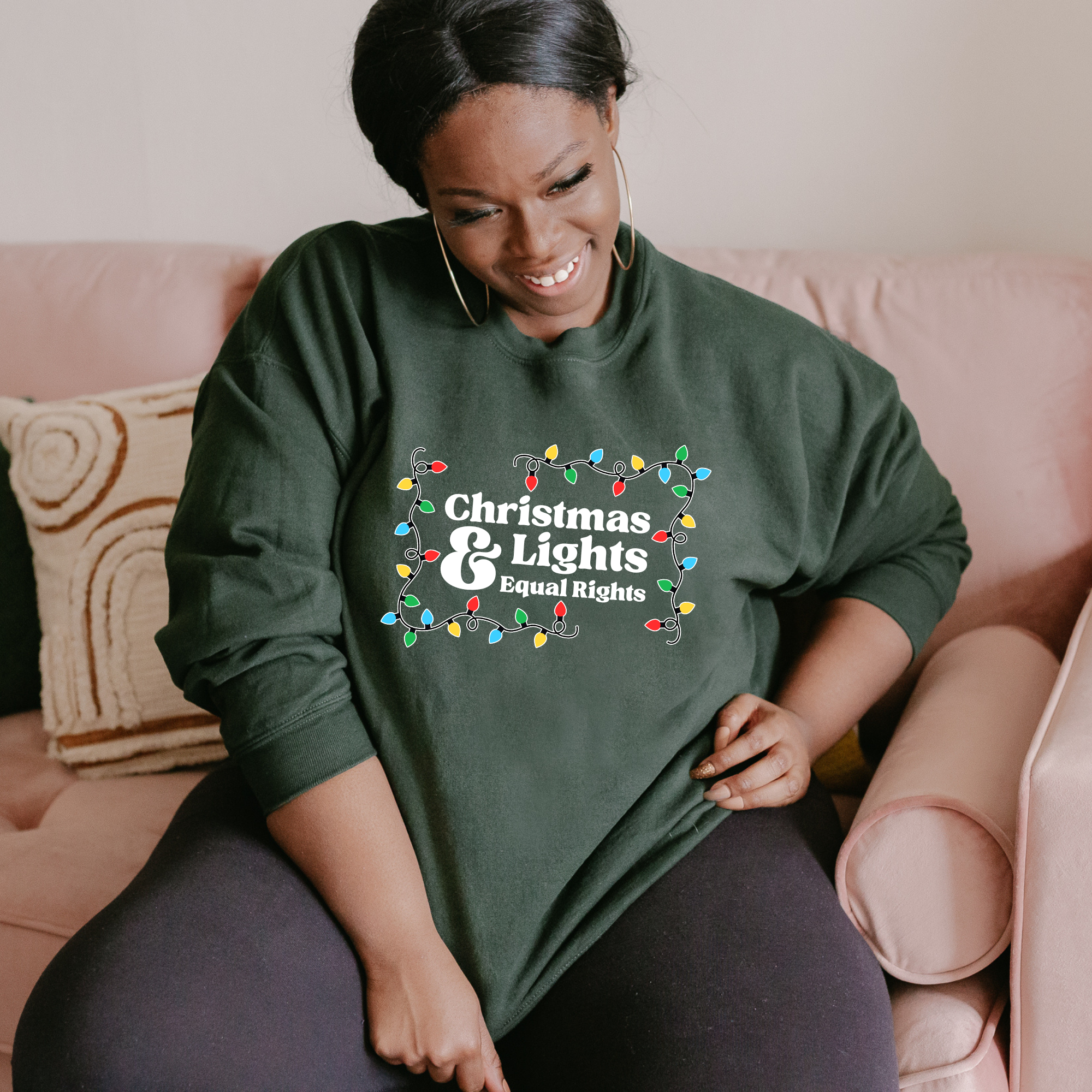 Shop Christmas Lights and Equal Rights Graphic Top- at Ruby Joy Boutique, a Women's Clothing Store in Pickerington, Ohio