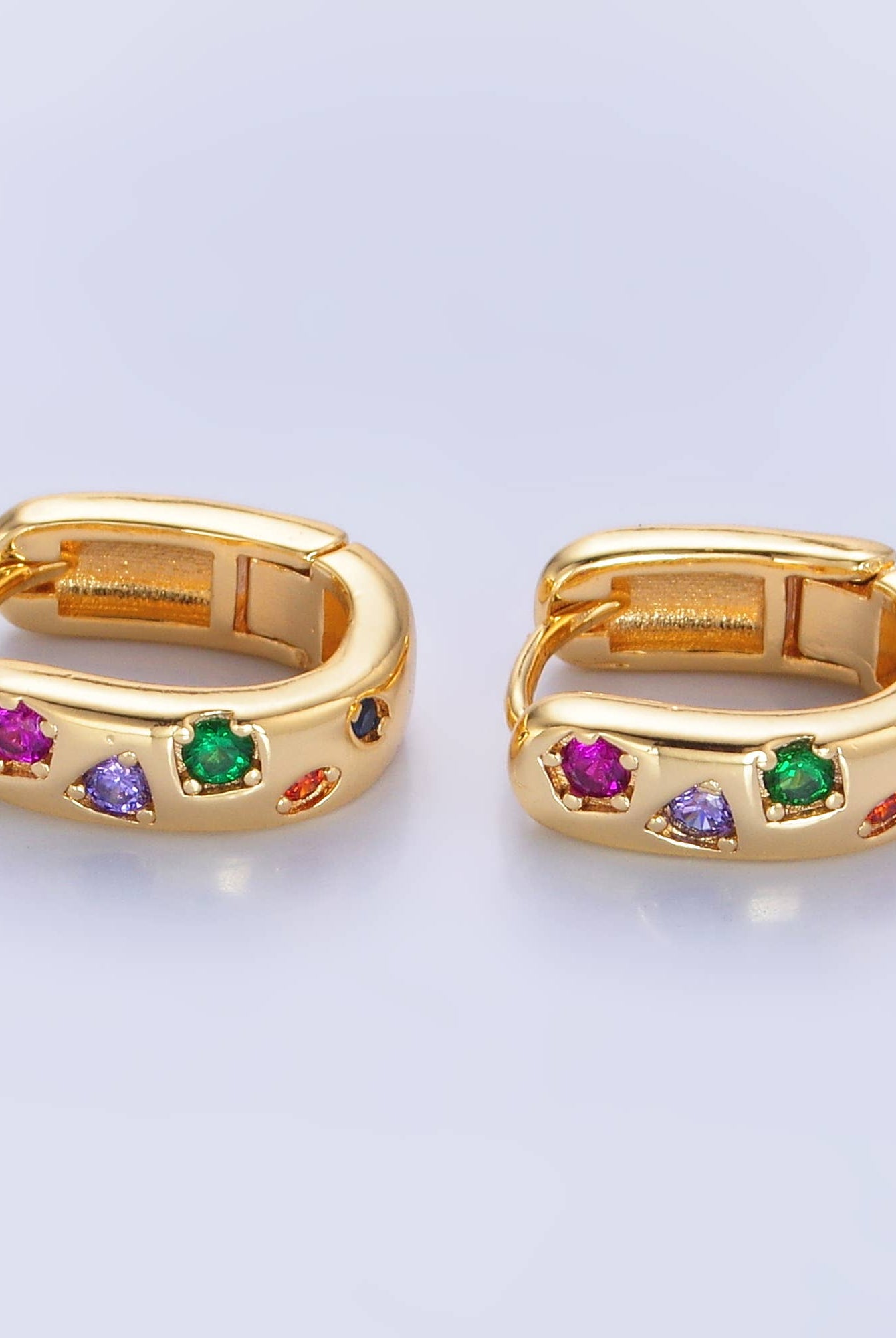 Shop Colorful Crystal Huggie Earrings- at Ruby Joy Boutique, a Women's Clothing Store in Pickerington, Ohio
