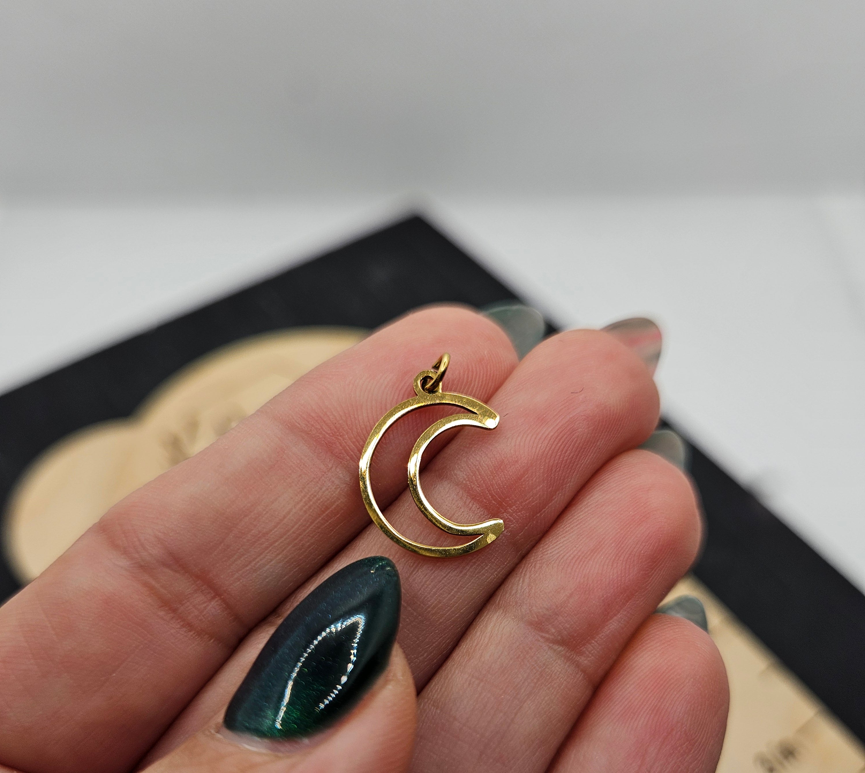 Shop Crescent Moon Charm- at Ruby Joy Boutique, a Women's Clothing Store in Pickerington, Ohio