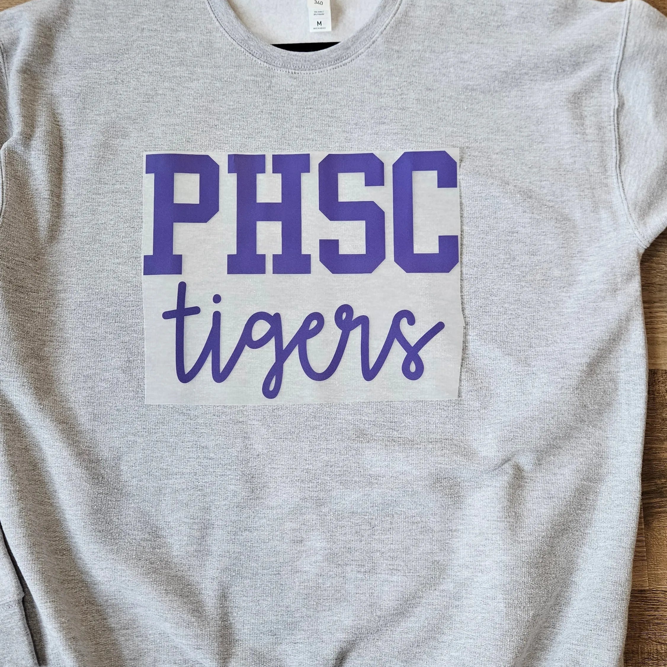 Shop Custom Mascot Script Sweatshirt-Small at Ruby Joy Boutique, a Women's Clothing Store in Pickerington, Ohio