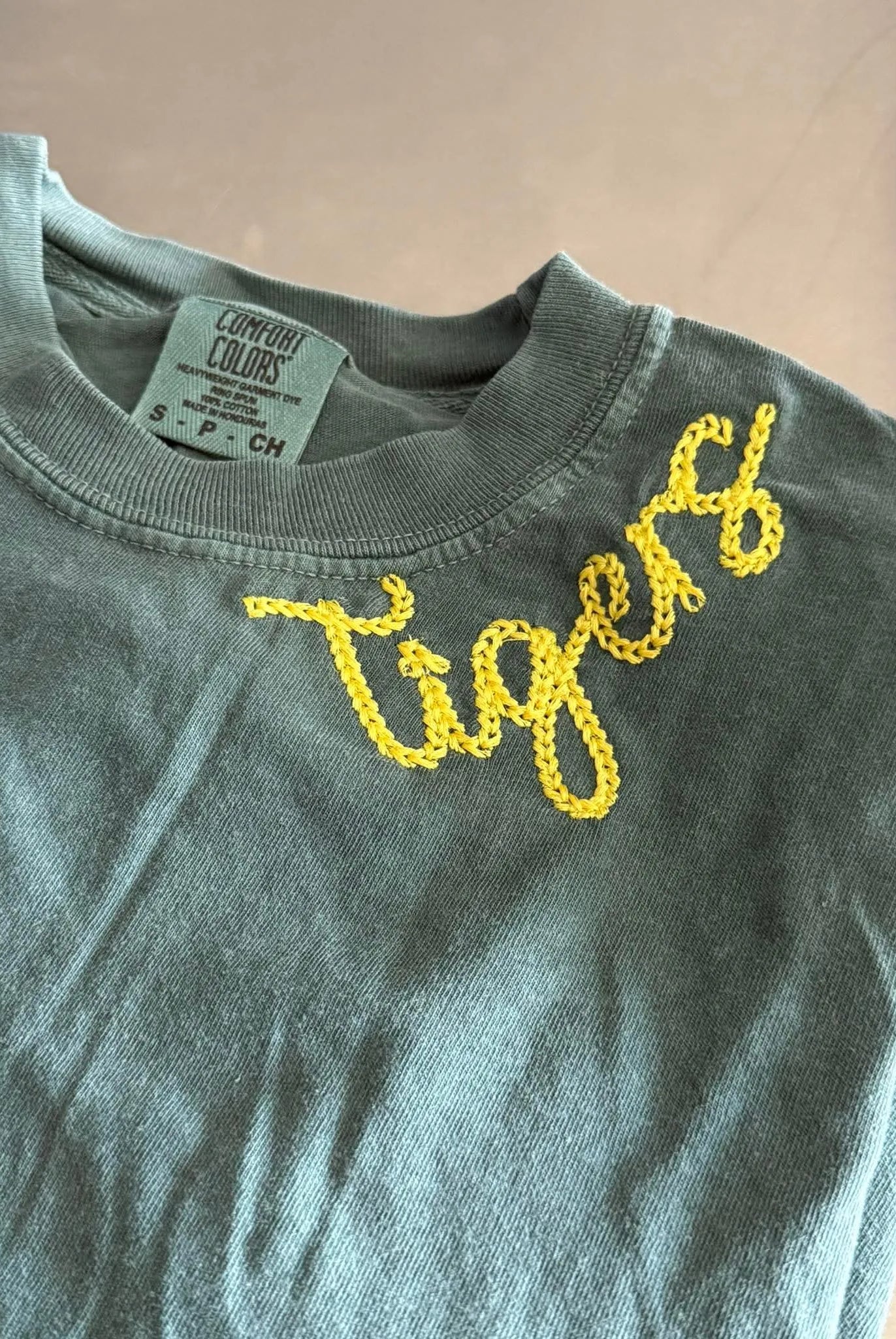 Shop Custom Retro Chainstitch Embroidered Top-T-Shirt at Ruby Joy Boutique, a Women's Clothing Store in Pickerington, Ohio