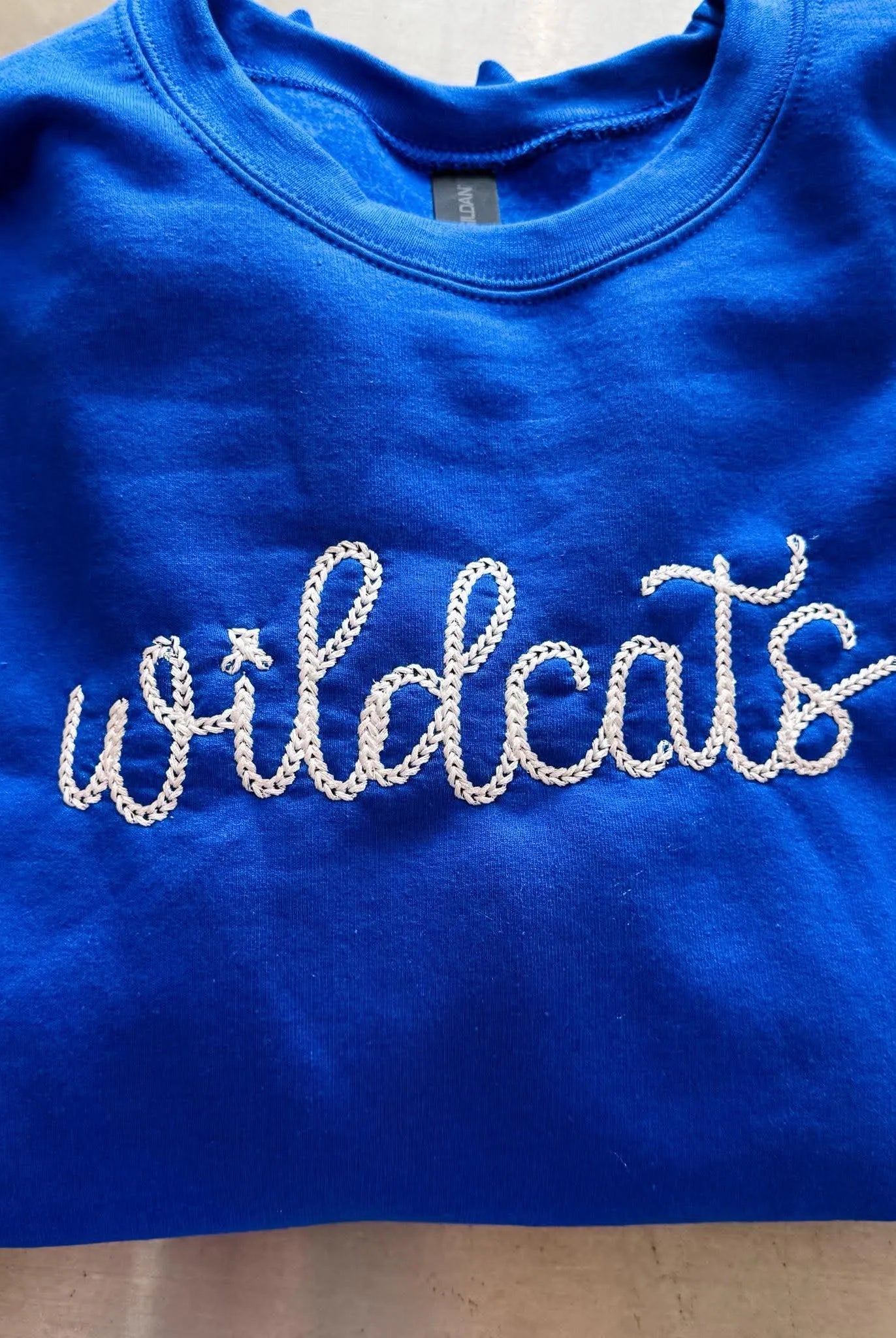 Shop Custom Retro Chainstitch Embroidered Top- at Ruby Joy Boutique, a Women's Clothing Store in Pickerington, Ohio