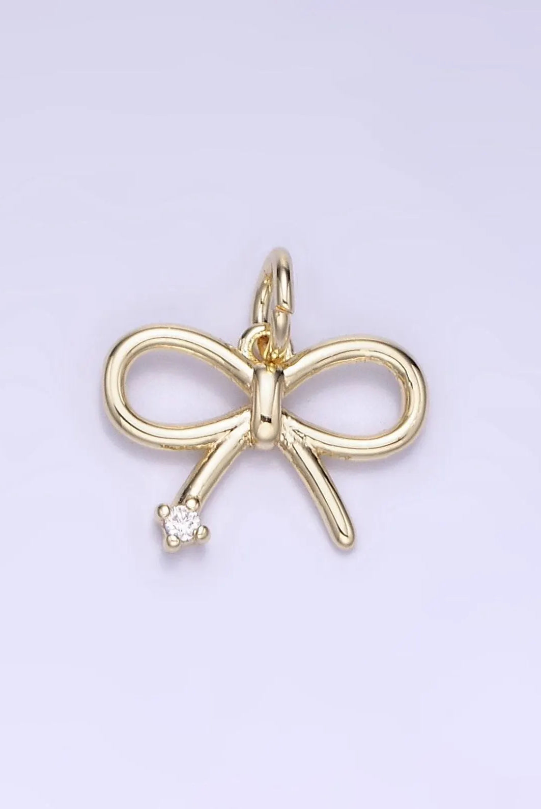 Shop Dainty Bow Charm- at Ruby Joy Boutique, a Women's Clothing Store in Pickerington, Ohio