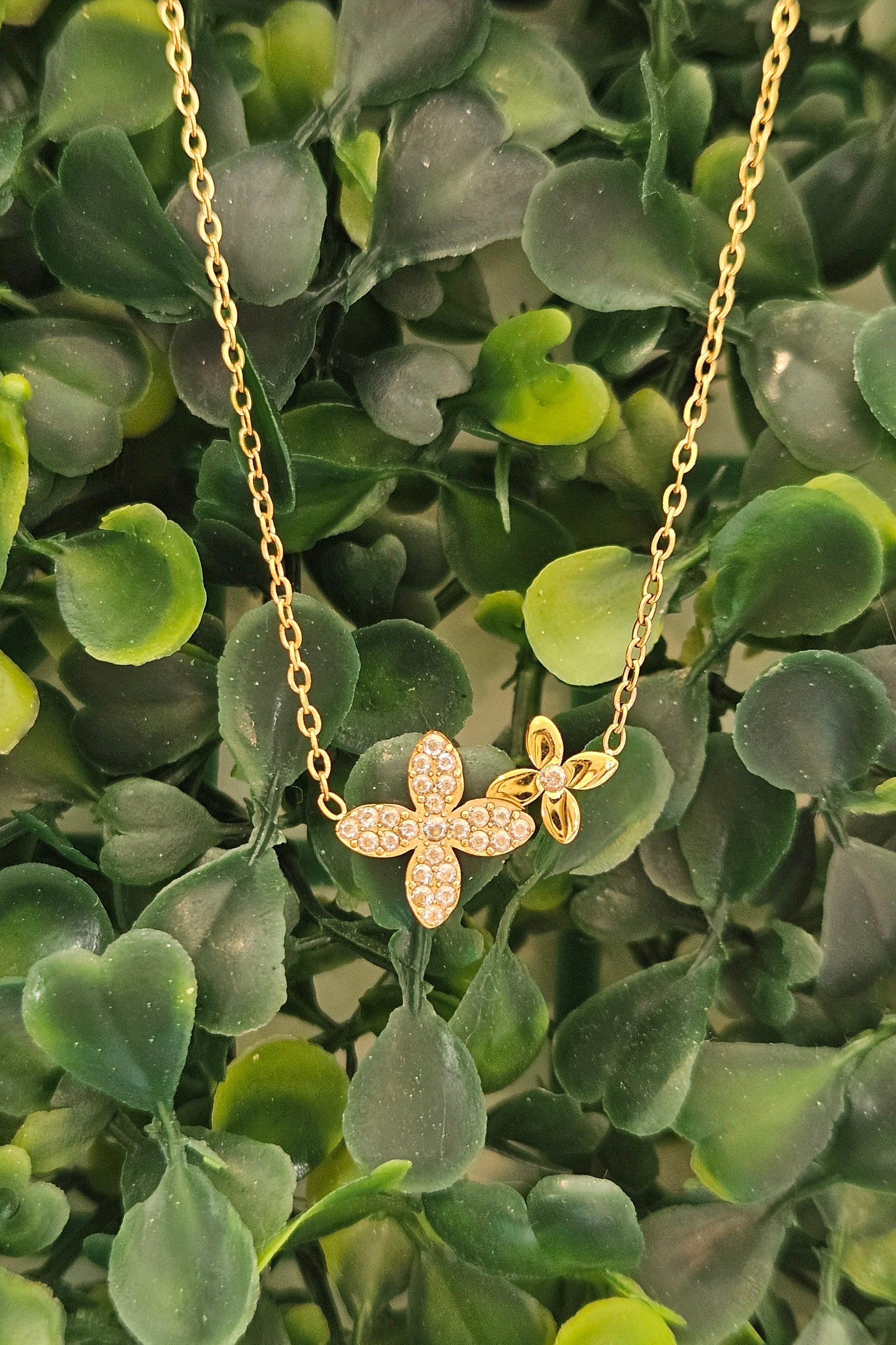 Shop Double Flower Water Resistant Necklace- at Ruby Joy Boutique, a Women's Clothing Store in Pickerington, Ohio