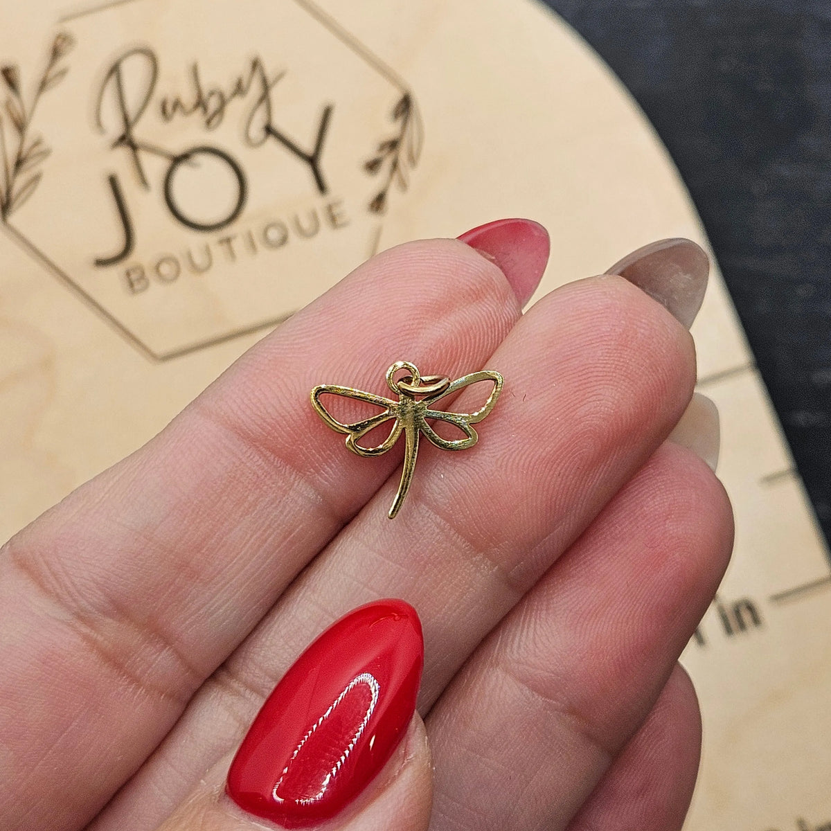Shop Dragonfly Outline Charm- at Ruby Joy Boutique, a Women's Clothing Store in Pickerington, Ohio