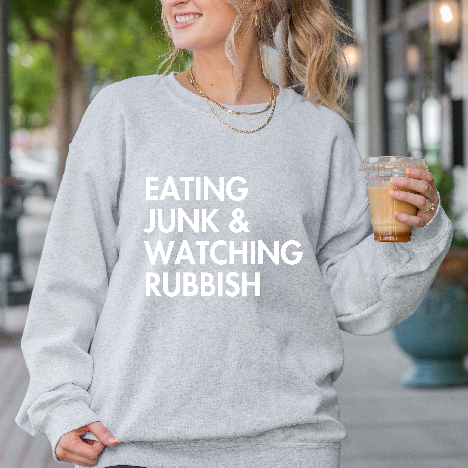 Shop Eating Junk & Watching Rubbish Graphic Top | Home Alone Christmas- at Ruby Joy Boutique, a Women's Clothing Store in Pickerington, Ohio