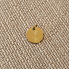 Shop Engraved Birth Flower Charms-Charms at Ruby Joy Boutique, a Women's Clothing Store in Pickerington, Ohio